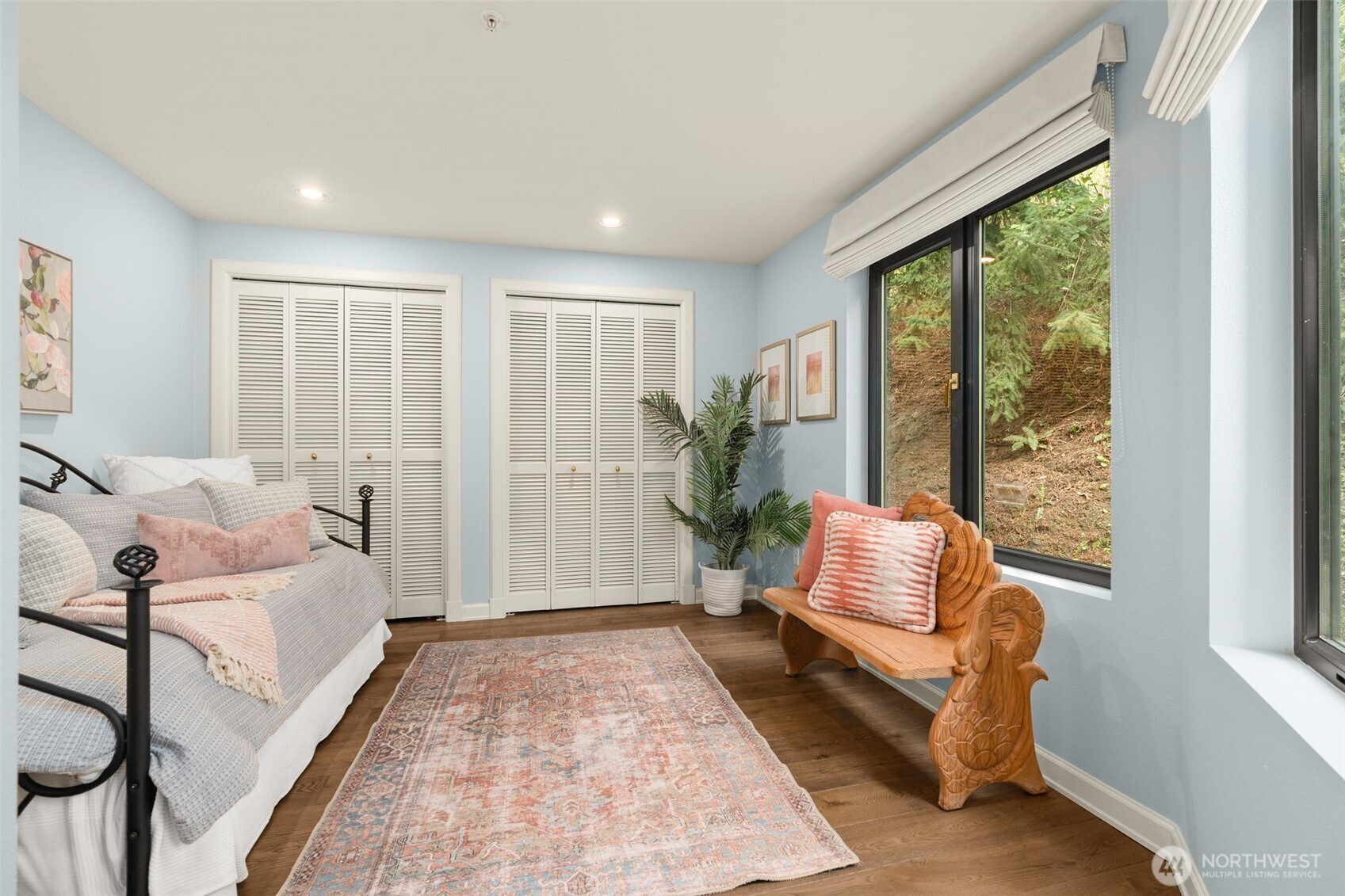 1333 Harbor Avenue Southwest, Unit 204 Seattle, WA 98116 - Photo 22 of 27 a spacious bedroom with a bed and a large window