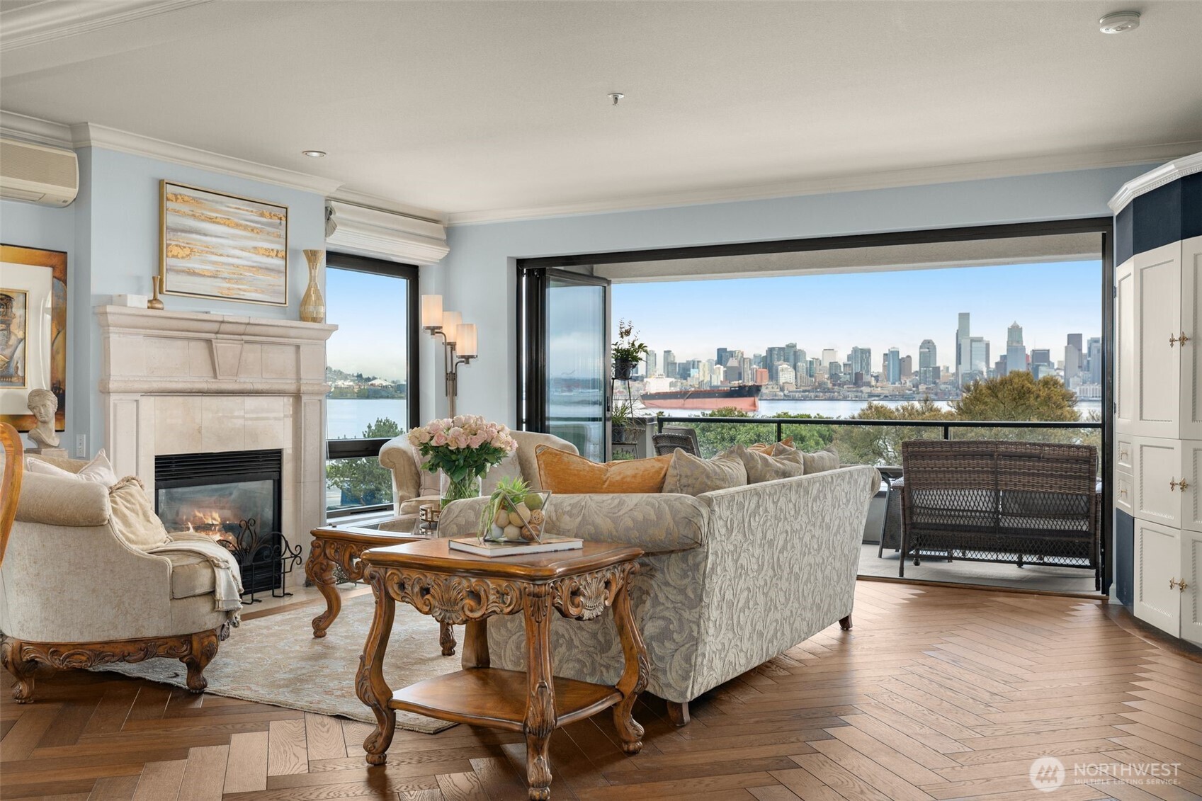 1333 Harbor Avenue Southwest, Unit 204 Seattle, WA 98116 - Photo 6 of 27 a living room with furniture and a fireplace