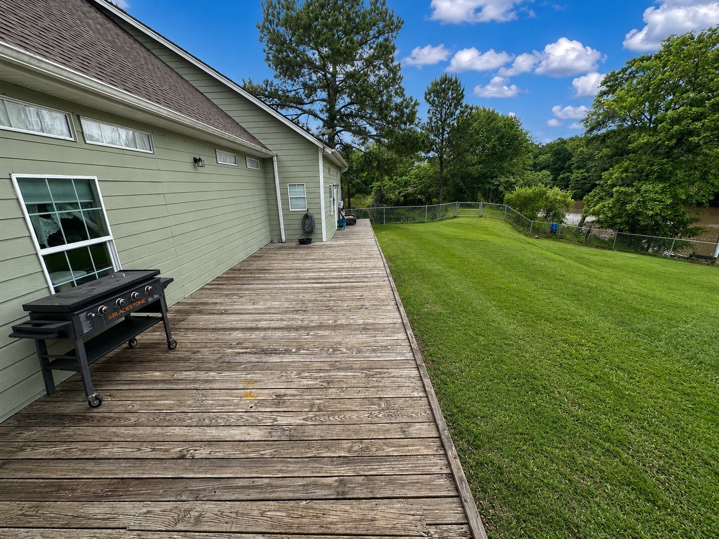 9012 Cooks Lake Road Lumberton, TX 77657 - Photo 33 of 36 a view of a backyard with sitting area