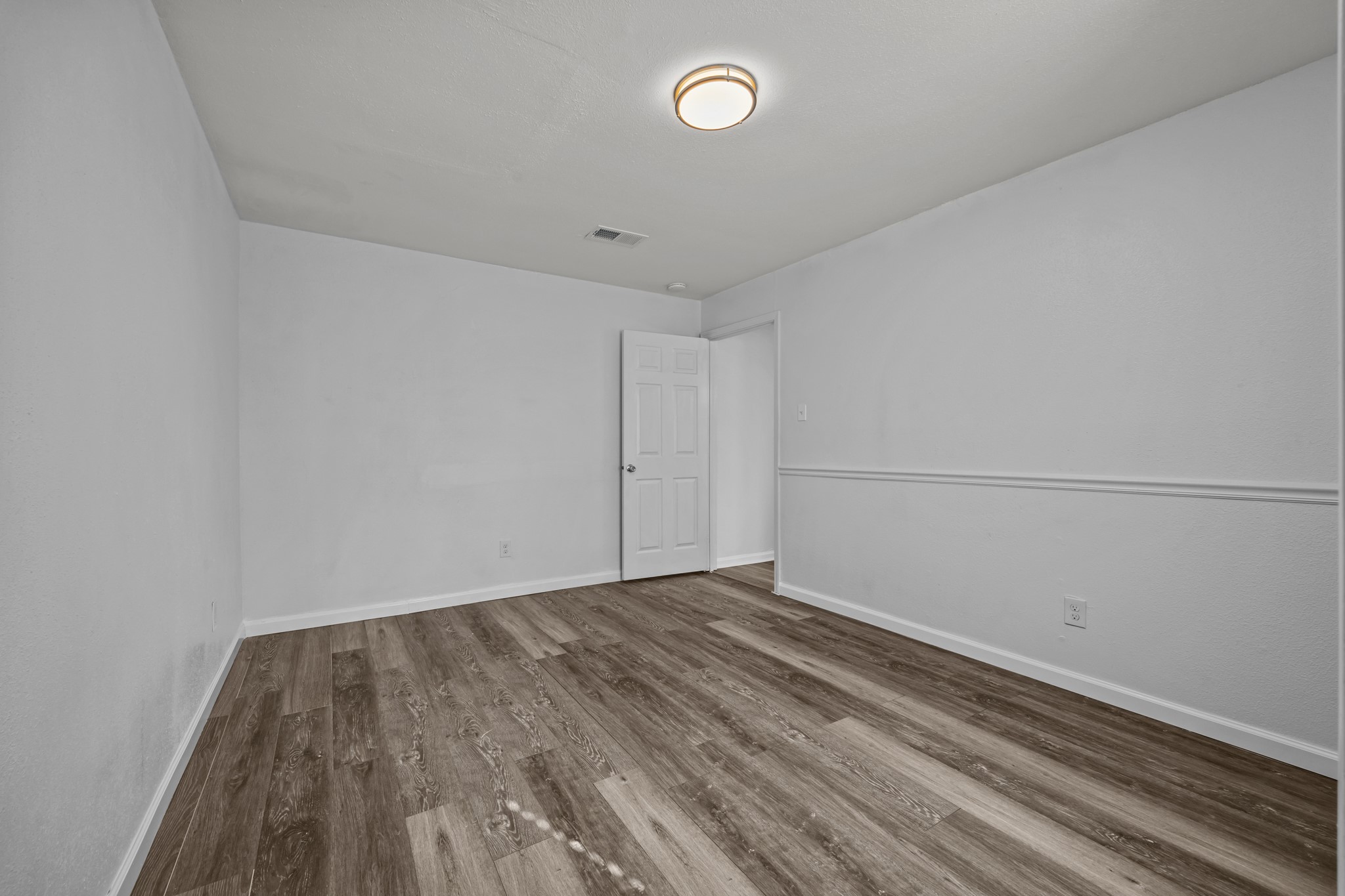 2103 6th Street Stafford, TX 77477 - Photo 23 of 27 a view of room with walk in closet