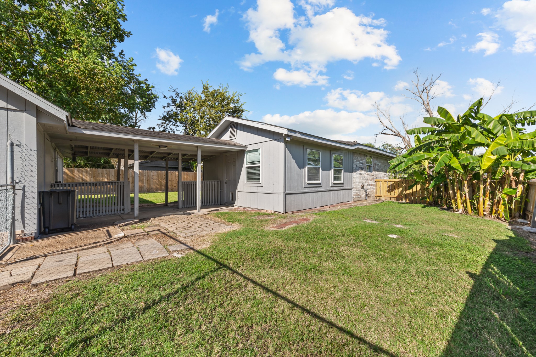 2103 6th Street Stafford, TX 77477 - Photo 24 of 27 a view of a house with a backyard