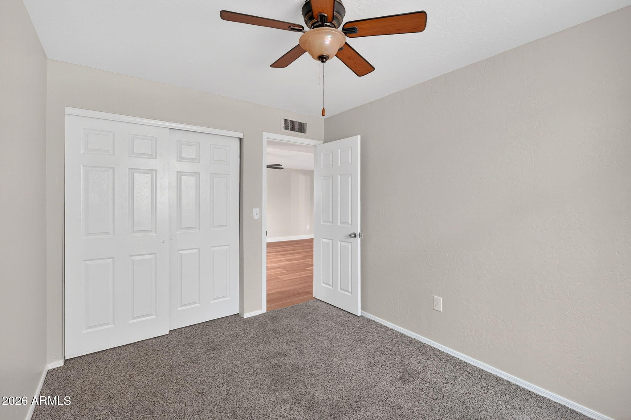 1417 East Mineral Road Gilbert, AZ 85234 - Photo 44 of 59 a view of a chandelier fan in a room
