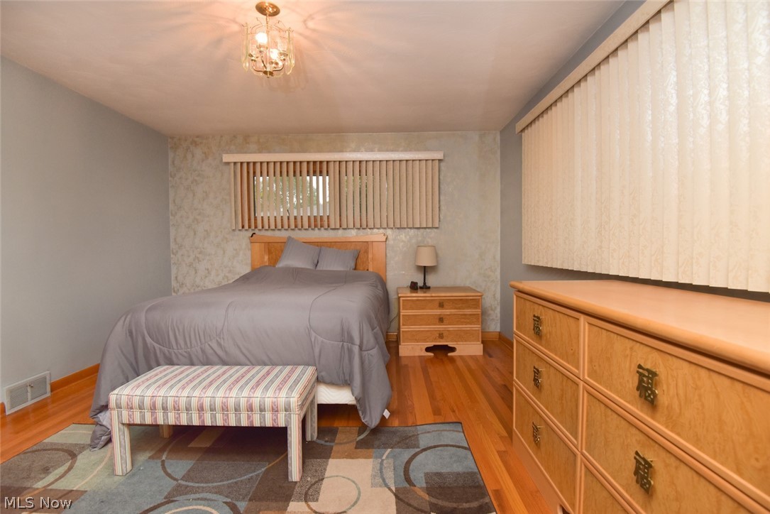 2804 Tibbetts Wick Road Hubbard, OH 44425 - Photo 11 of 17 Second of Three Bedrooms also featuring Hardwood Floors and room for large furniture!