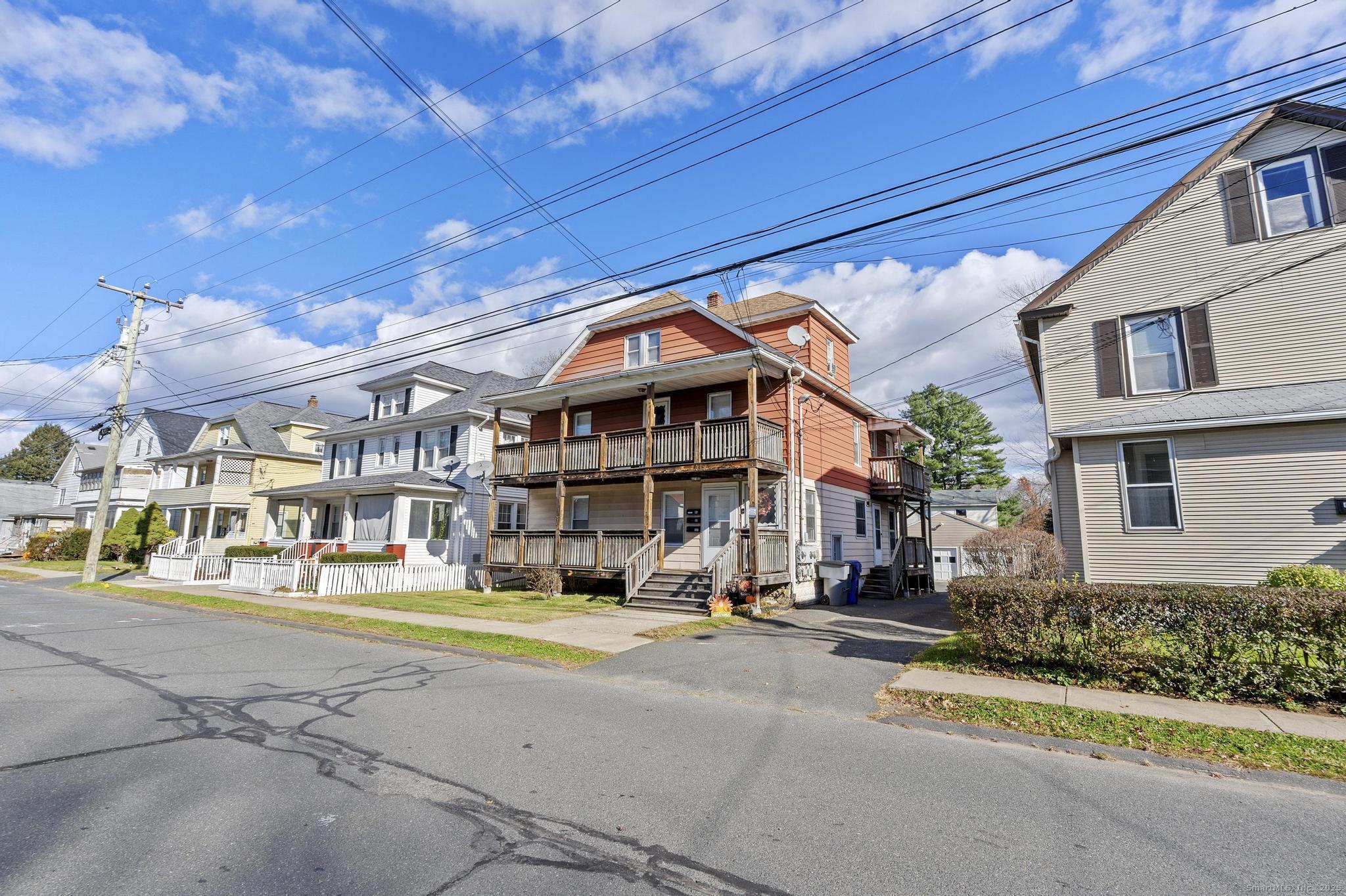 a front view of a building with street view