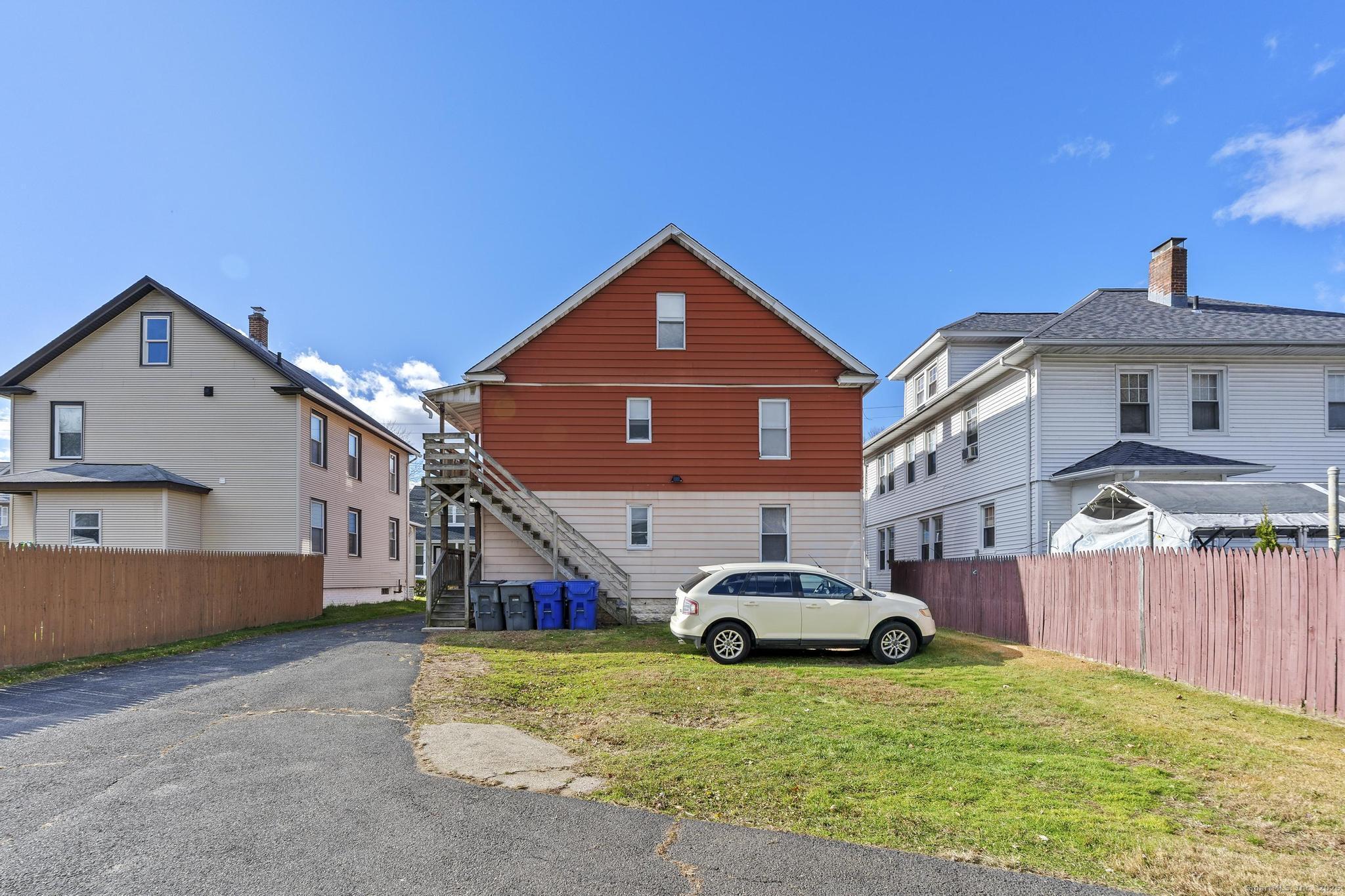 86 Windsor Street Enfield, CT 06082 - Photo 33 of 35 a front view of a house with a yard