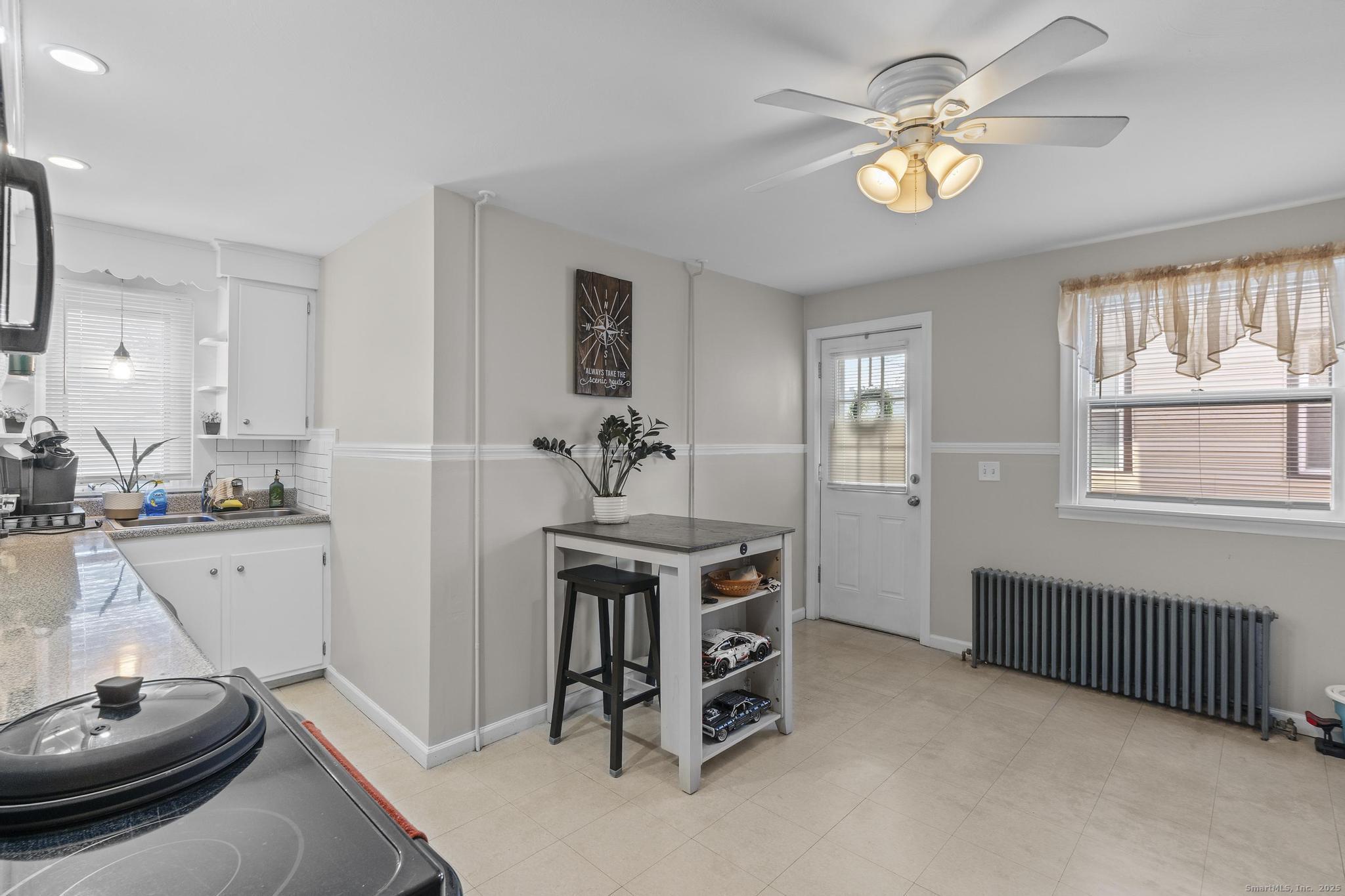 86 Windsor Street Enfield, CT 06082 - Photo 6 of 35 a view of a kitchen and a window