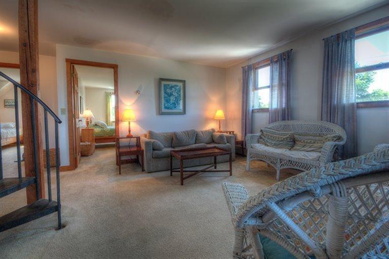 22 Knowles Heights Road Truro, MA 02666 - Photo 17 of 25 a living room with furniture and a window