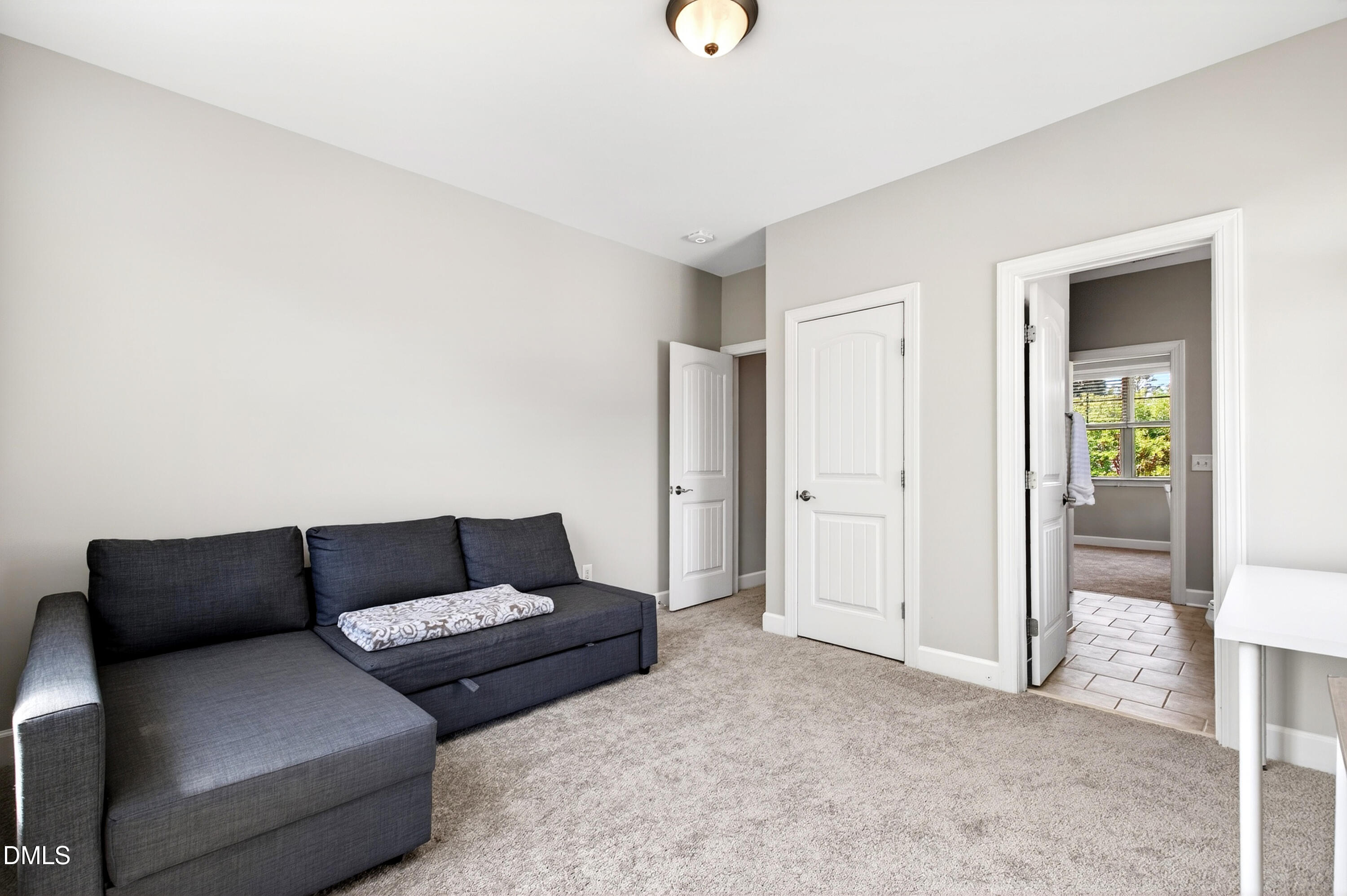 313 Karpen Lane Cary, NC 27519 - Photo 45 of 86 a living room with furniture and a rug