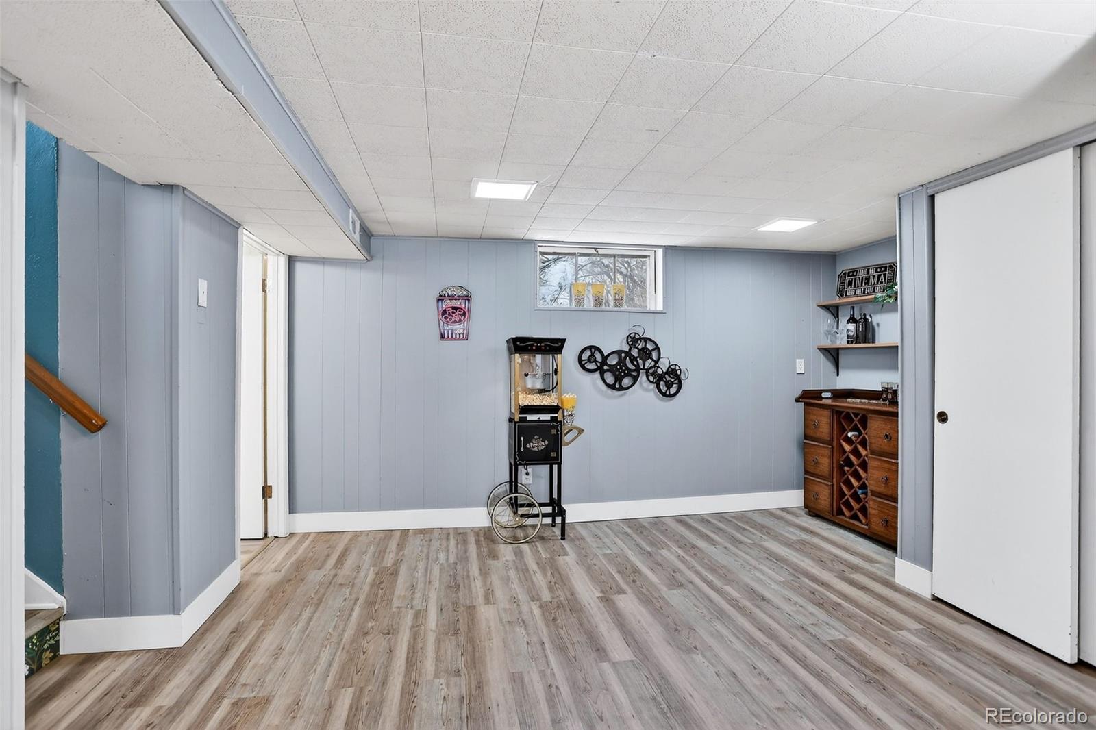 4185 Benton Street Denver, CO 80212 - Photo 25 of 40 a view of a livingroom with wooden floor and closet