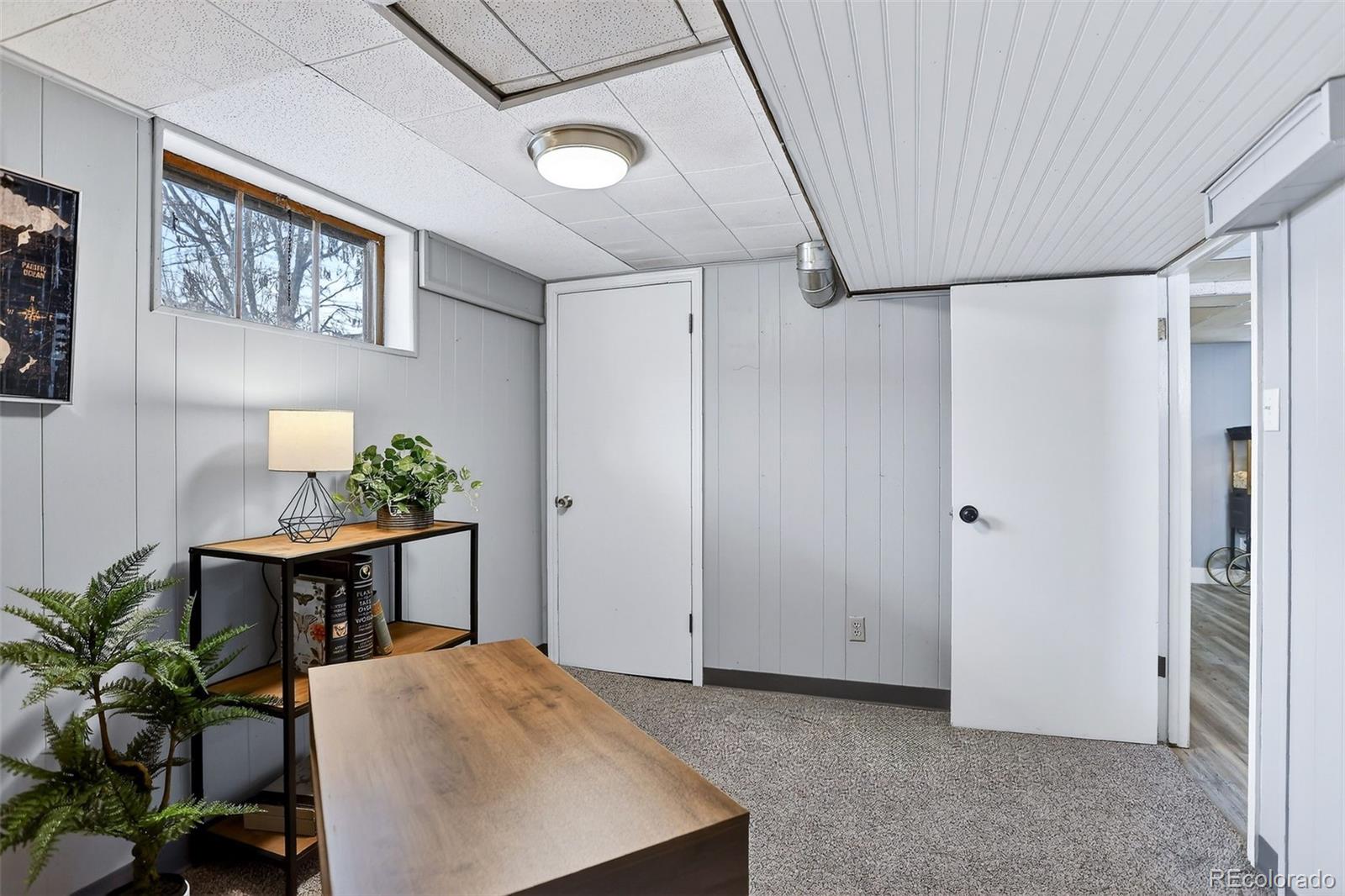 4185 Benton Street Denver, CO 80212 - Photo 27 of 40 a view of kitchen with furniture and refrigerator