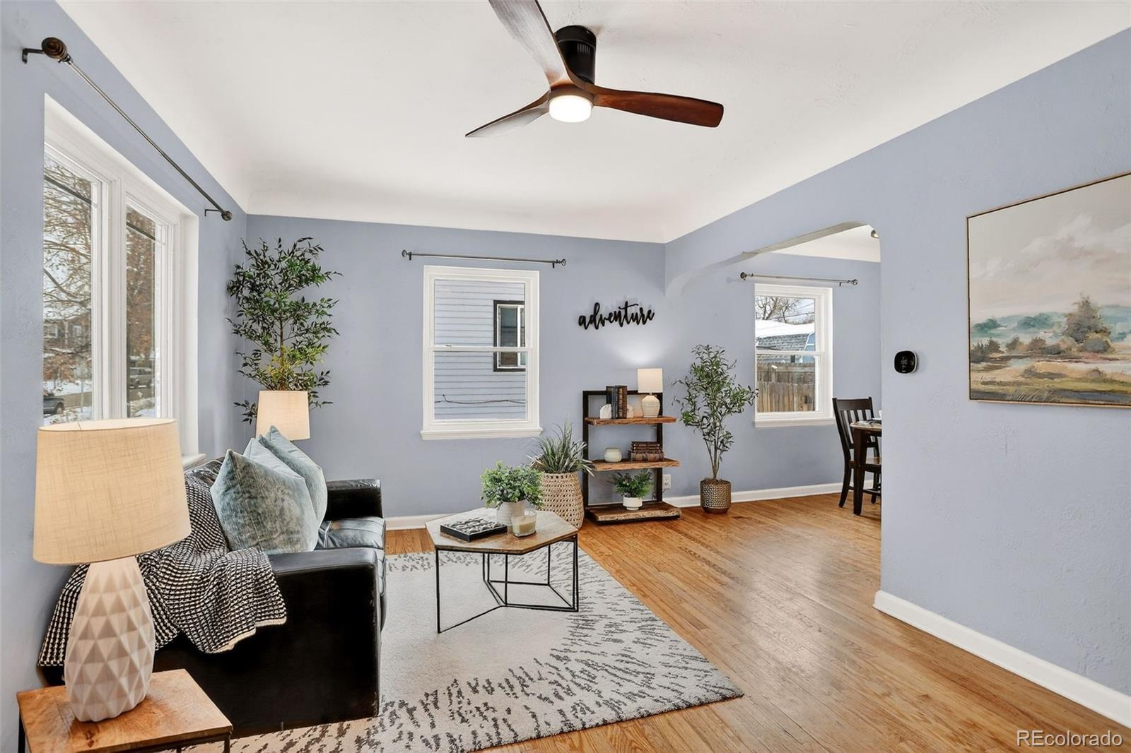 4185 Benton Street Denver, CO 80212 - Photo 8 of 40 a living room with furniture and a window