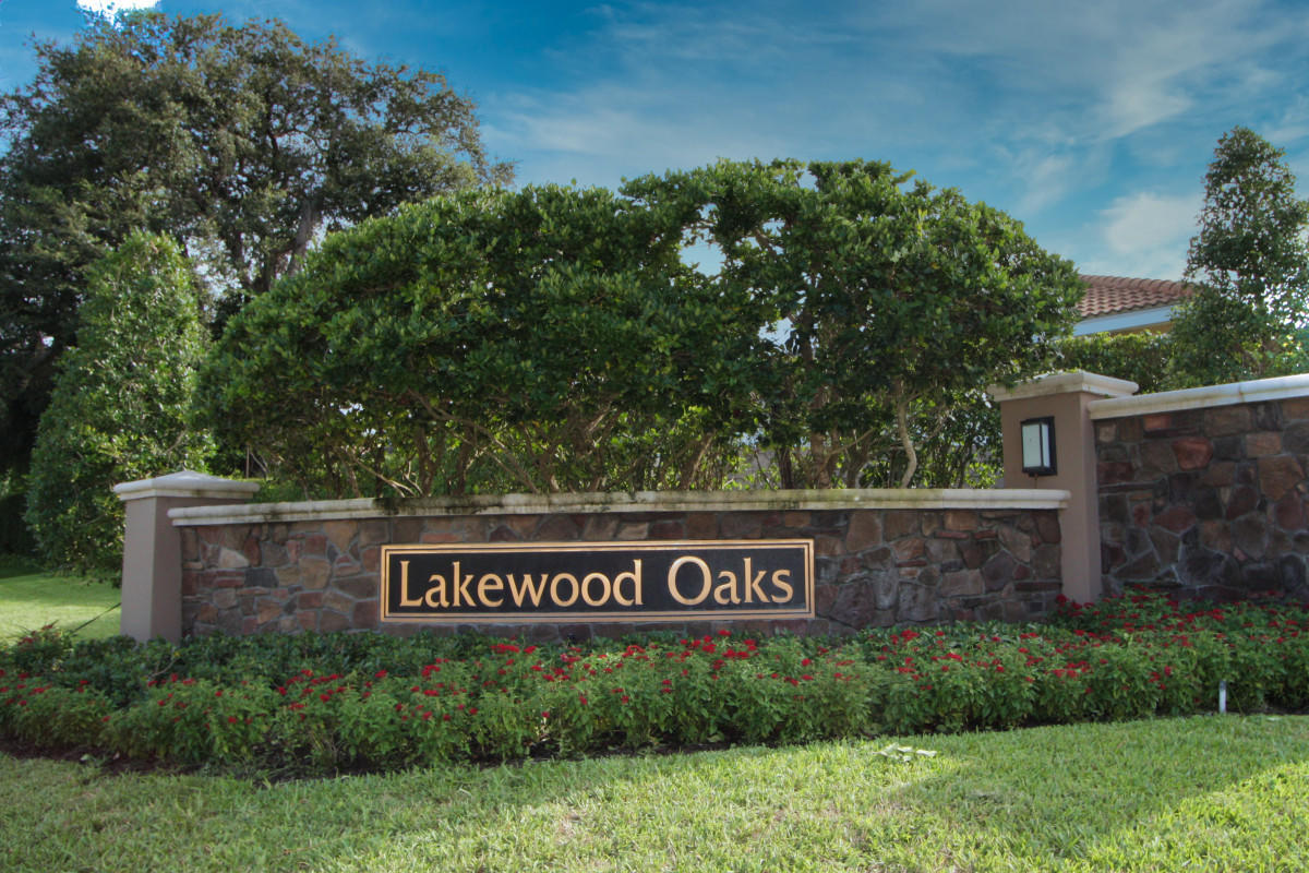 2541 Northwest 39th Street Boca Raton, FL 33434 - Photo 4 of 22 a view of outdoor space with garden and trees