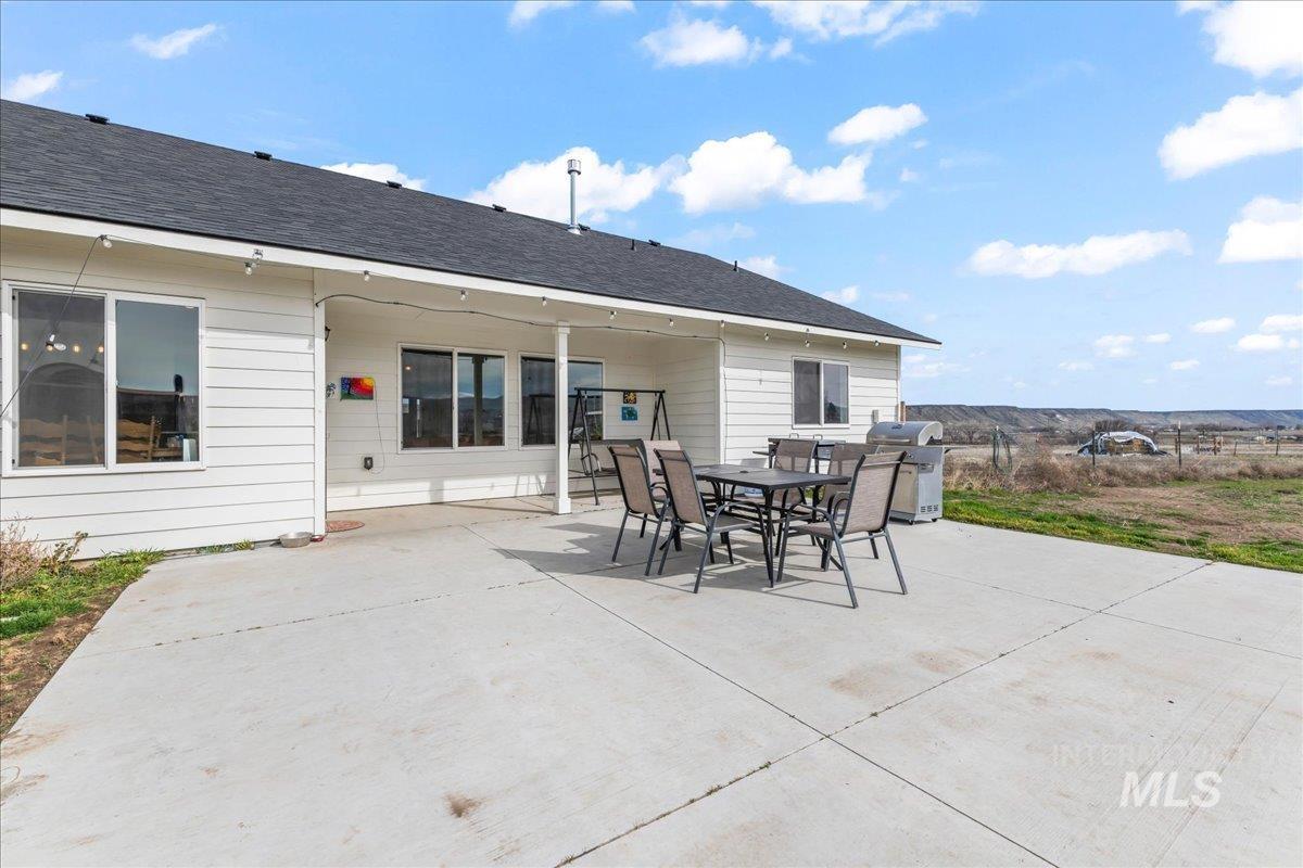 8843 Highway 78 Marsing, ID 83639 - Photo 34 of 48 View of patio featuring outdoor dining area and area for grilling