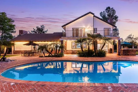 front view of a house with a small yard