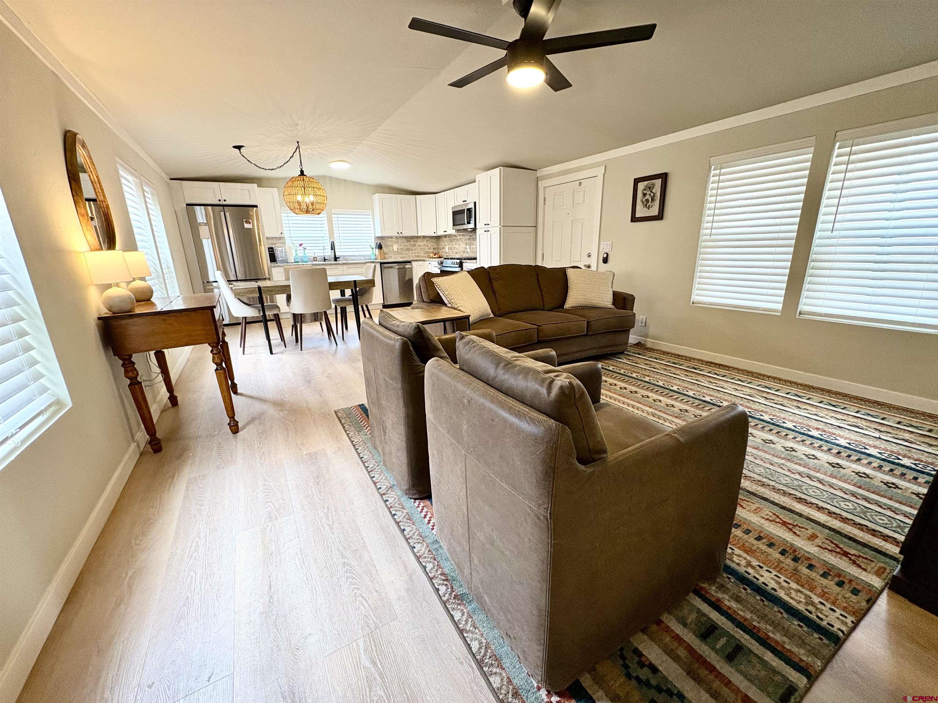 288 Animas View Drive, Unit 11 Durango, CO 81301 - Photo 14 of 23 a living room with furniture and a large window