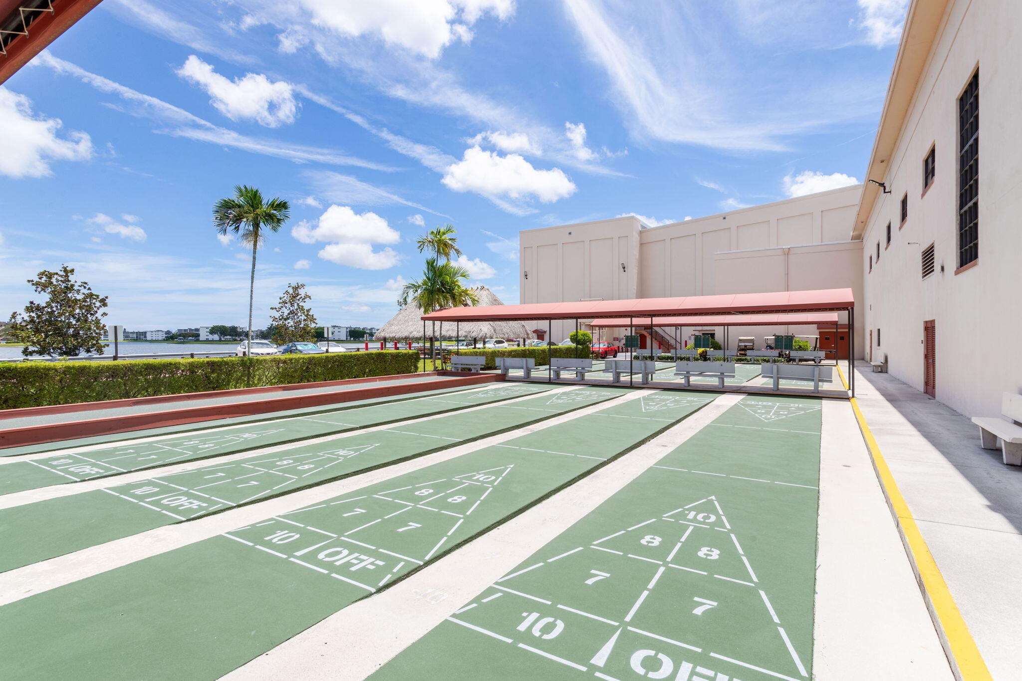 104 Mansfield C, Unit C Boca Raton, FL 33434 - Photo 31 of 40 a view of building with an entryway