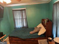 1319 Washington Street Huntingdon, PA 16652 - Photo 15 of 20 Cozy retreat with vibrant teal walls.