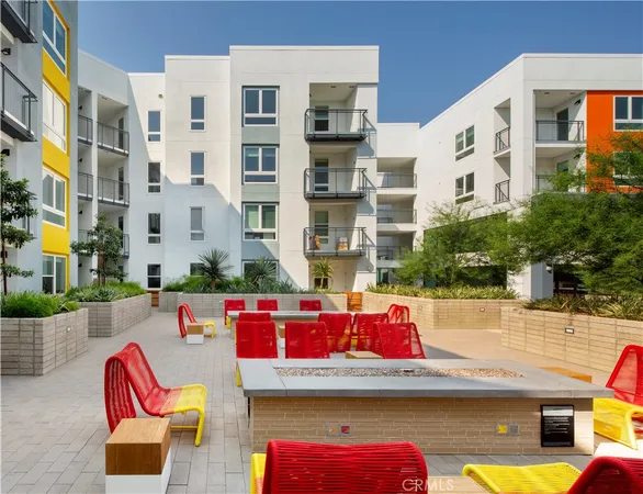 a view of a patio with swimming pool