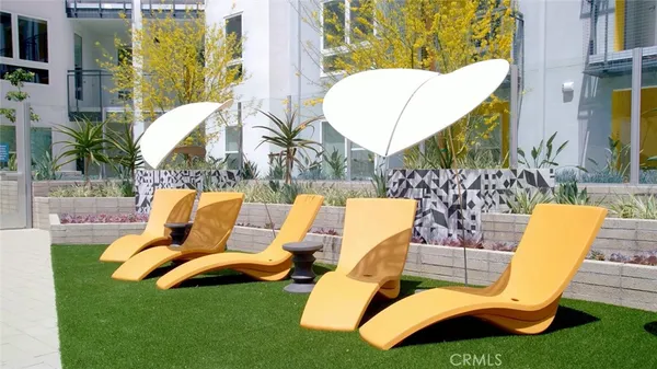 a view of building with outdoor seating