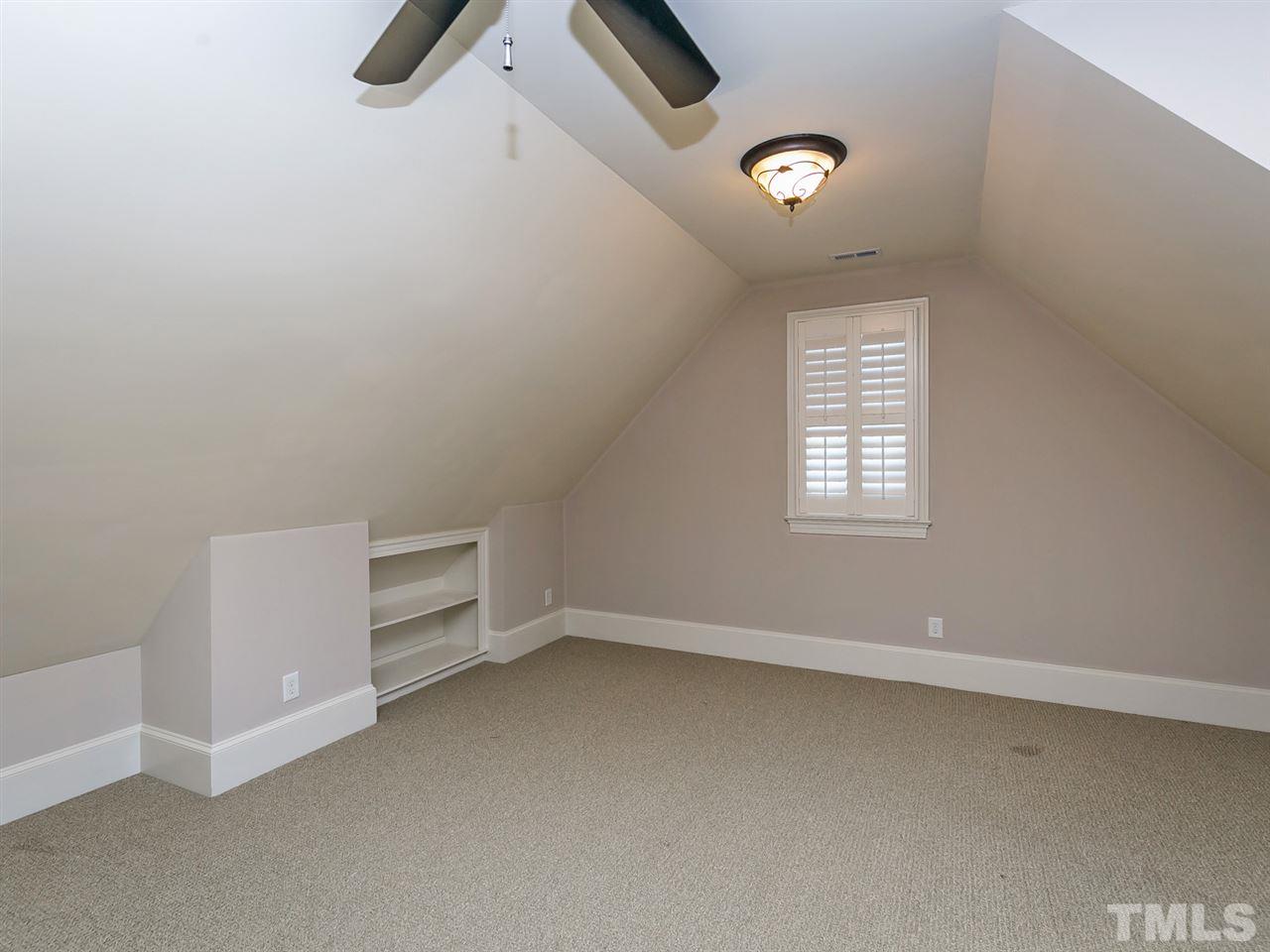 1077 Tacketts Pond Drive Raleigh, NC 27614 - Photo 22 of 30 a view of an empty room with a window