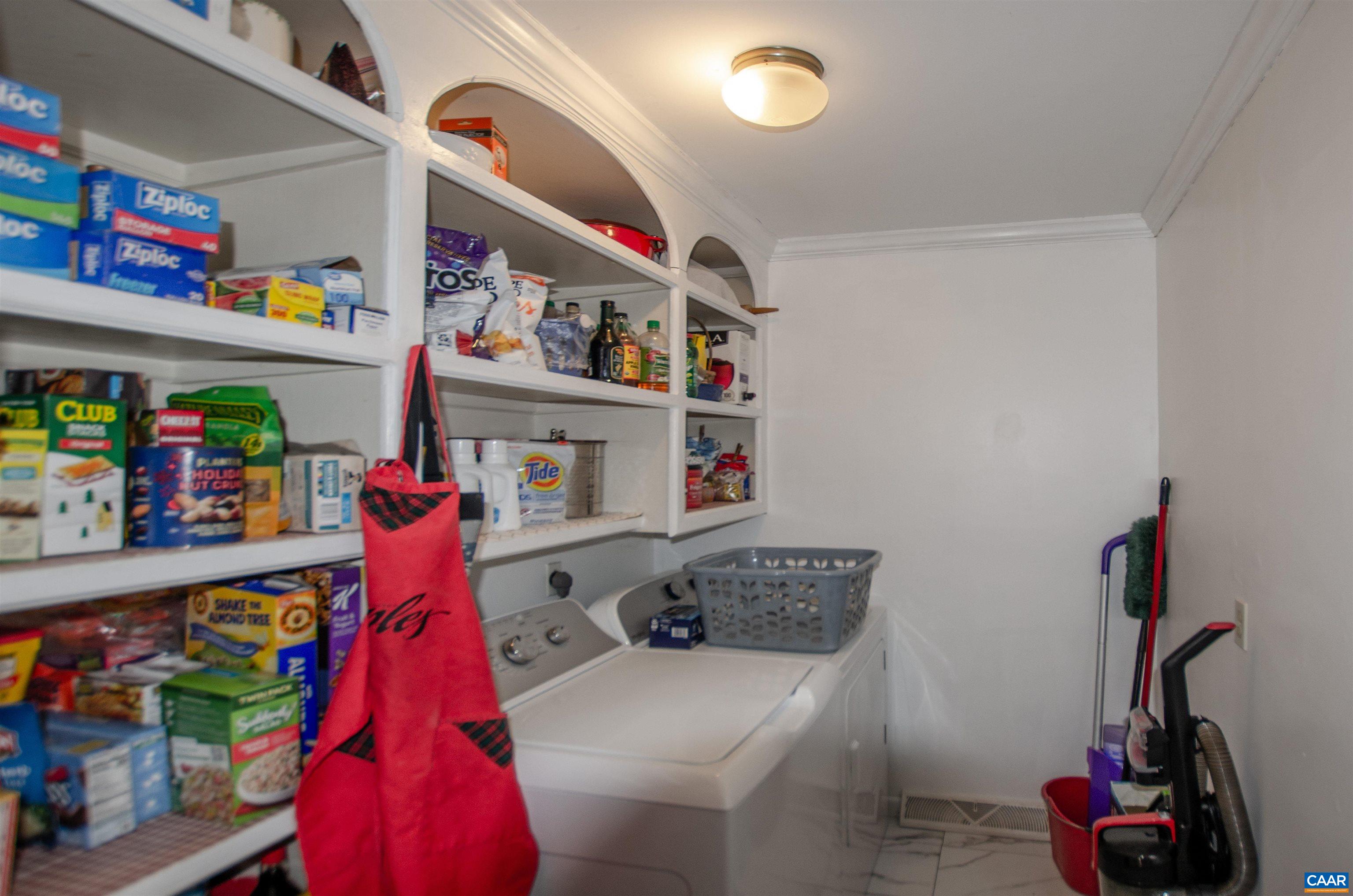 1709 Courthouse Road Palmyra, VA 22963 - Photo 12 of 59 a utility room with dryer washer and shoe rack