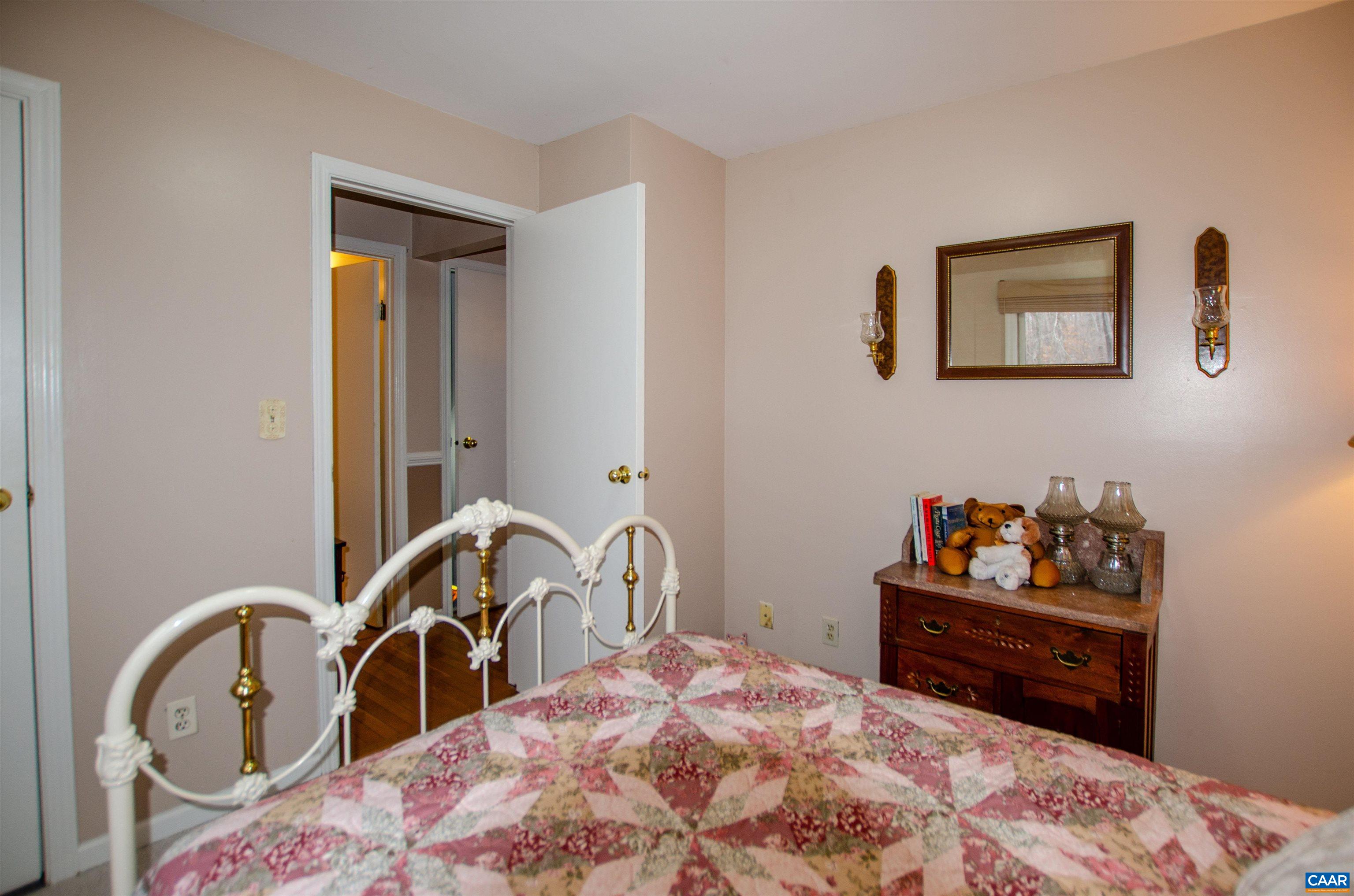 1709 Courthouse Road Palmyra, VA 22963 - Photo 19 of 59 a bedroom with a bed and a dresser