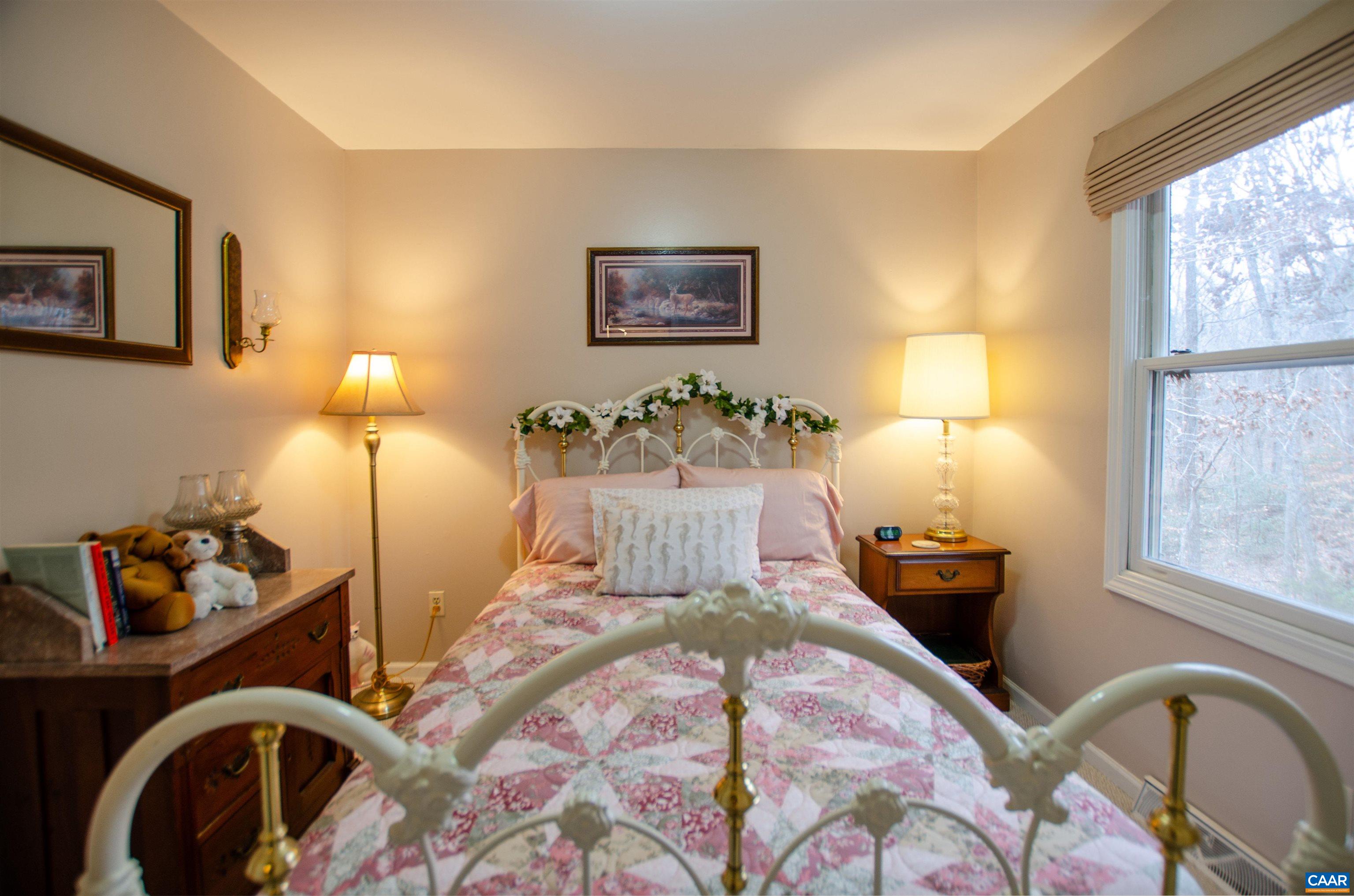 1709 Courthouse Road Palmyra, VA 22963 - Photo 20 of 59 a bed room with a bed and a window