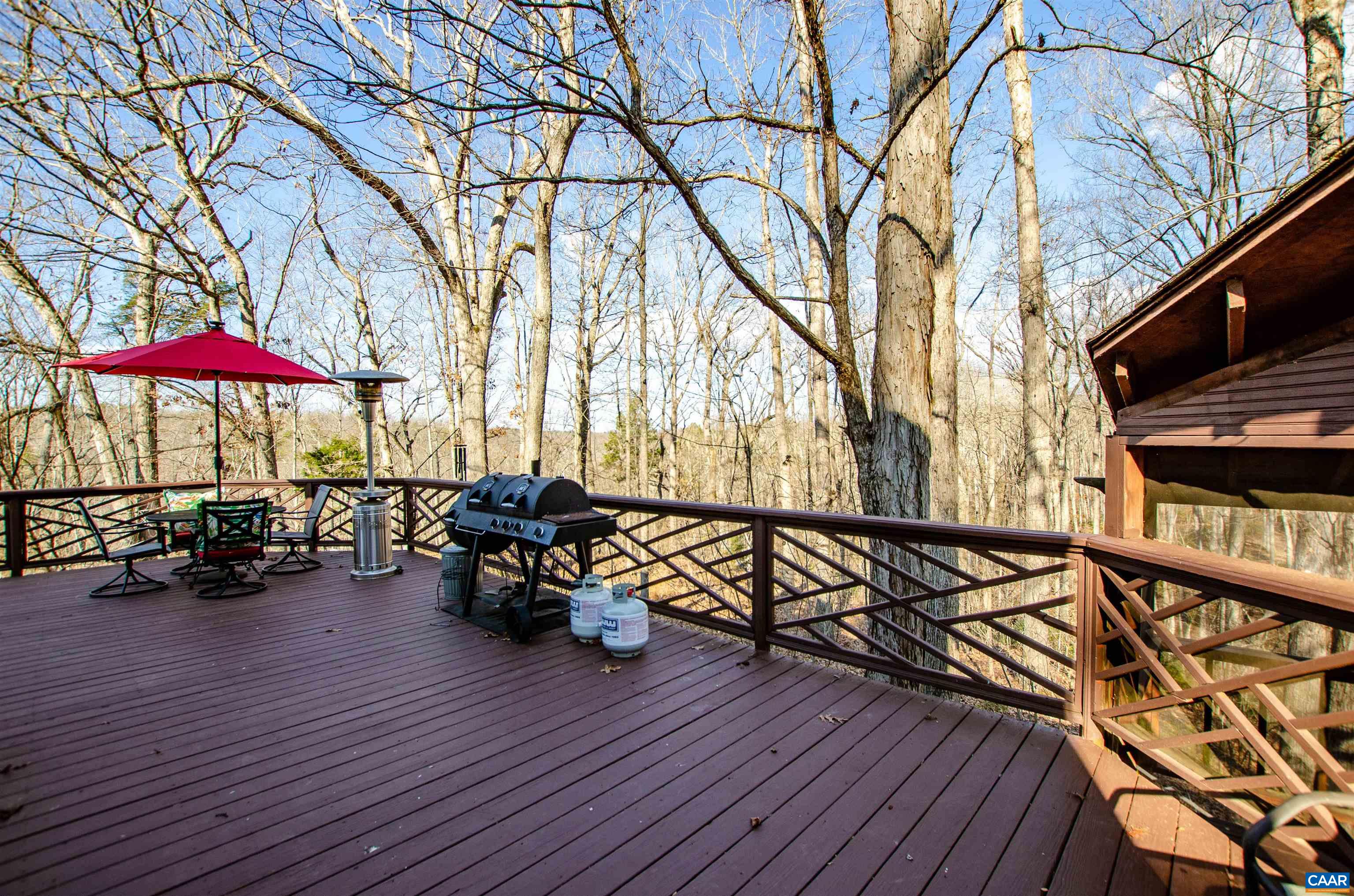 1709 Courthouse Road Palmyra, VA 22963 - Photo 2 of 59 a view of a balcony with chairs and wooden floor