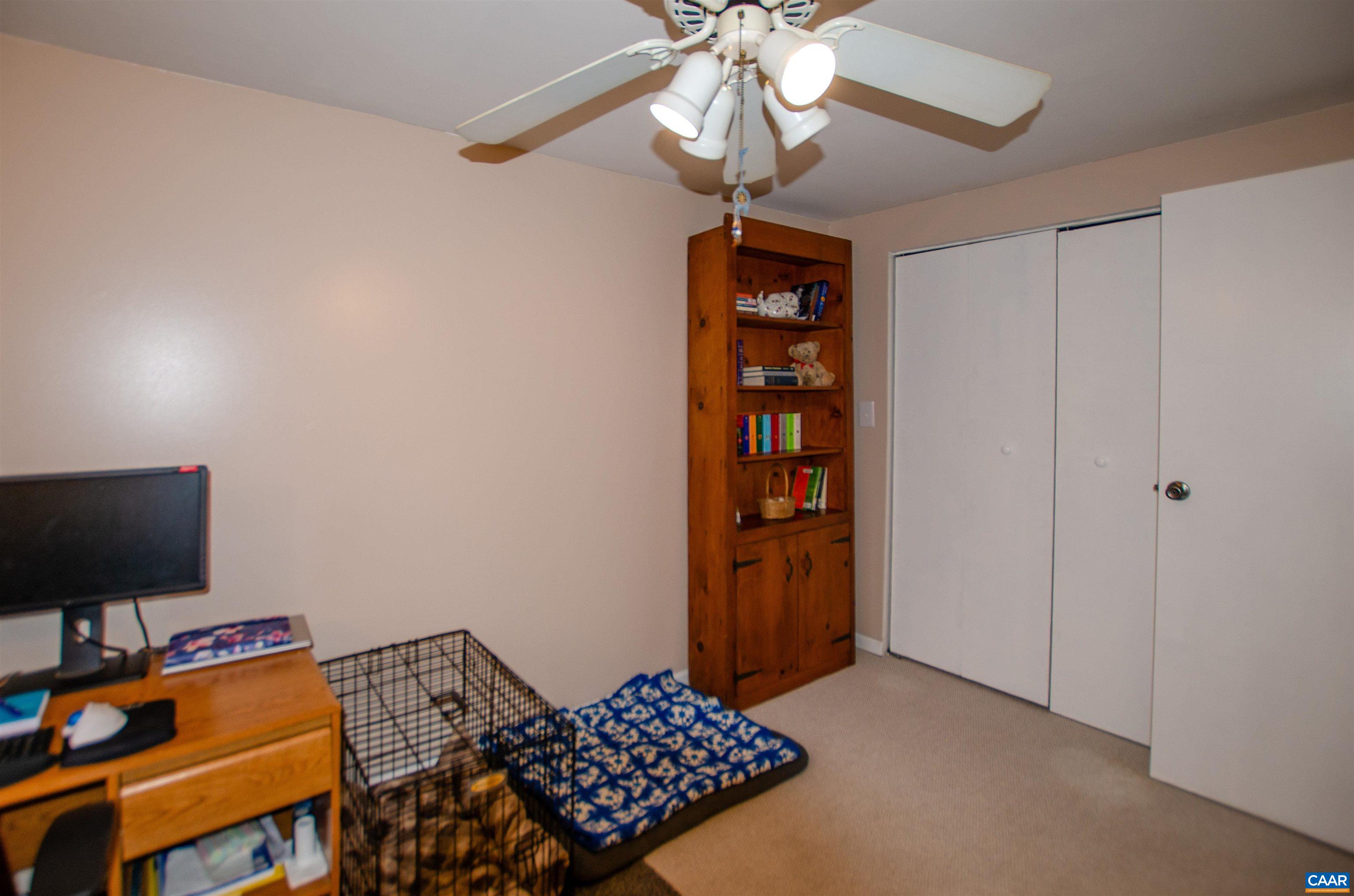 1709 Courthouse Road Palmyra, VA 22963 - Photo 32 of 59 a bedroom with a bed and a flat screen tv