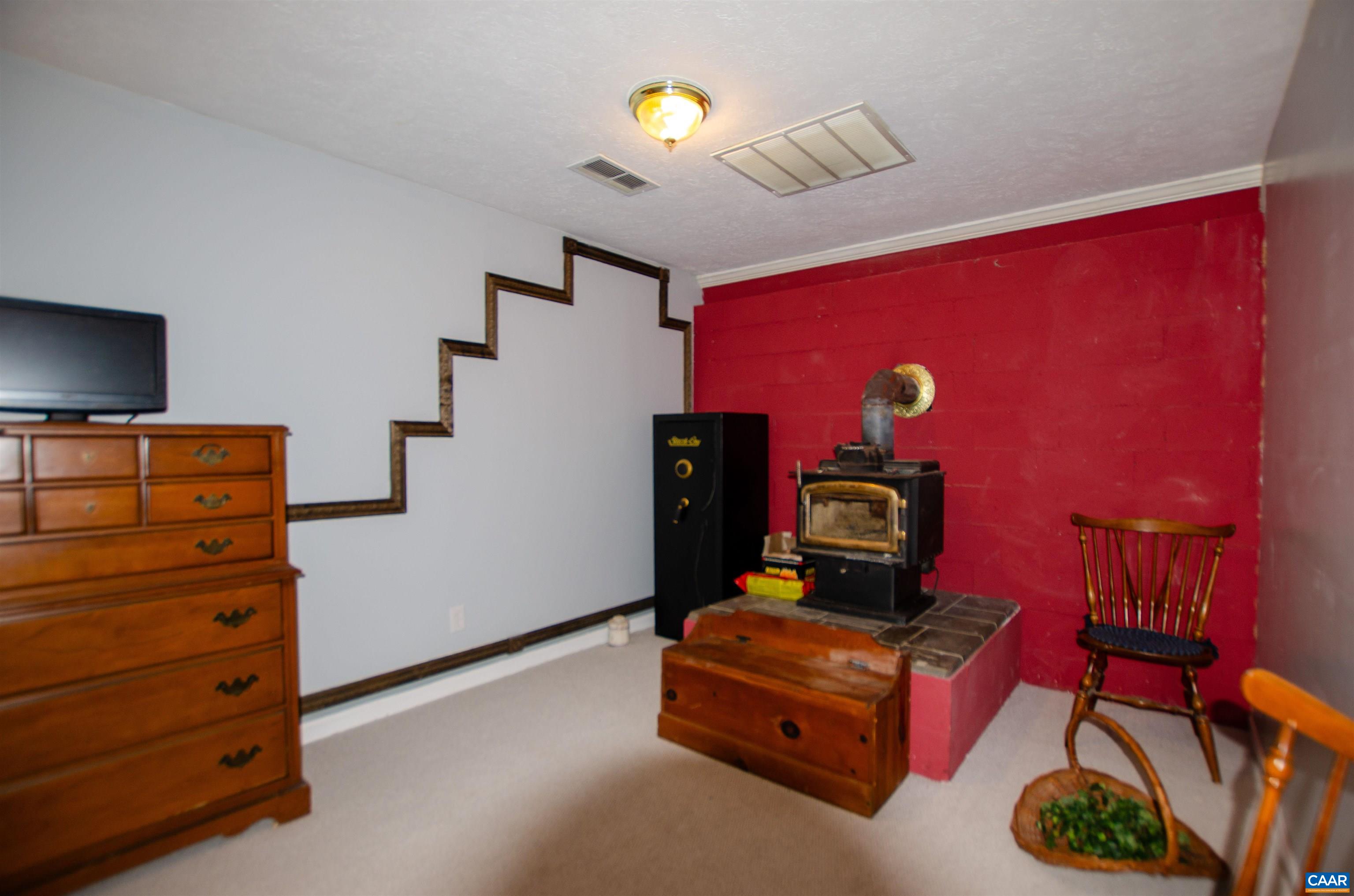 1709 Courthouse Road Palmyra, VA 22963 - Photo 35 of 59 a room with furniture and gym equipment