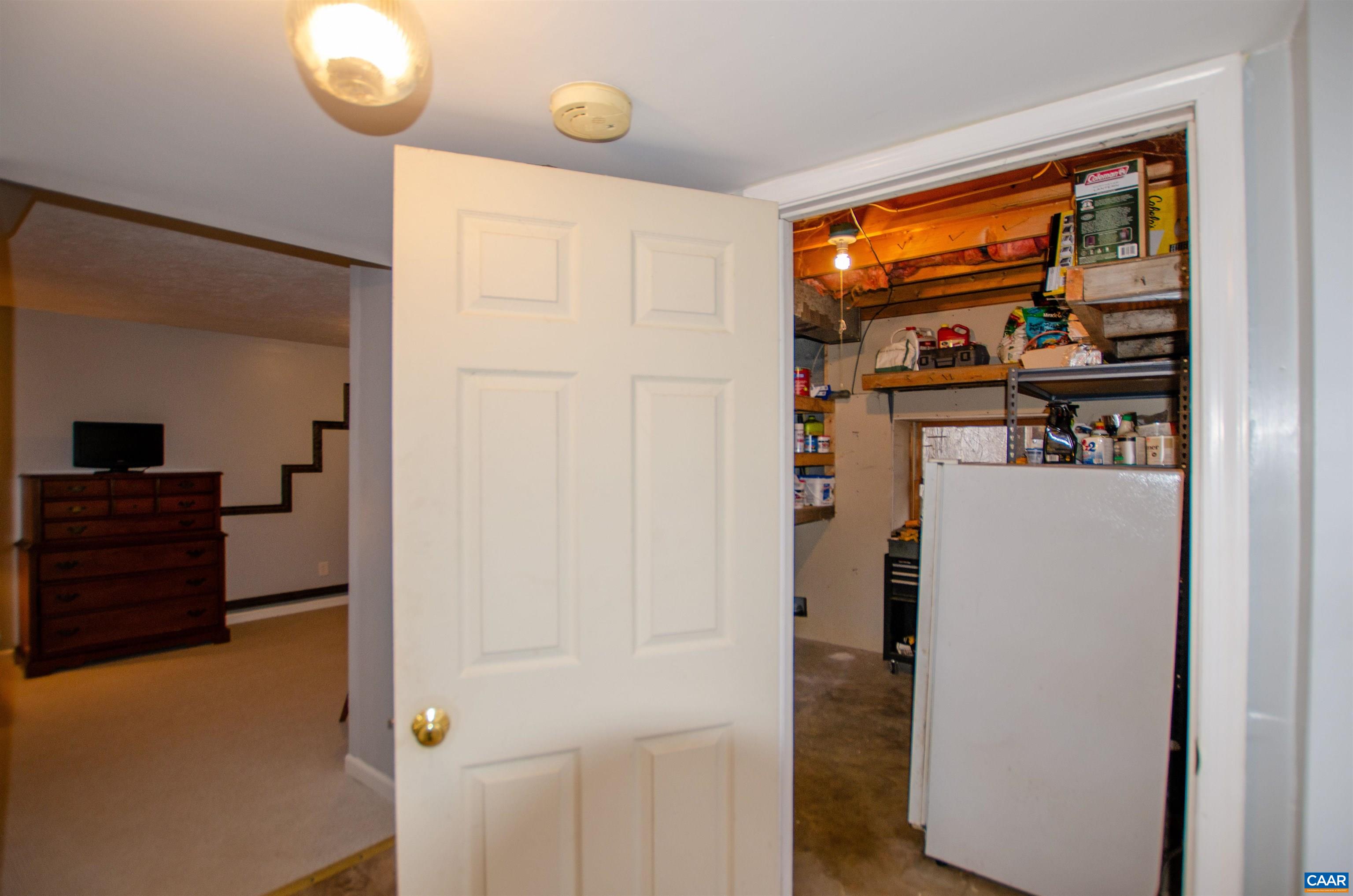 1709 Courthouse Road Palmyra, VA 22963 - Photo 38 of 59 a view of walk in closet with clothes and shoes