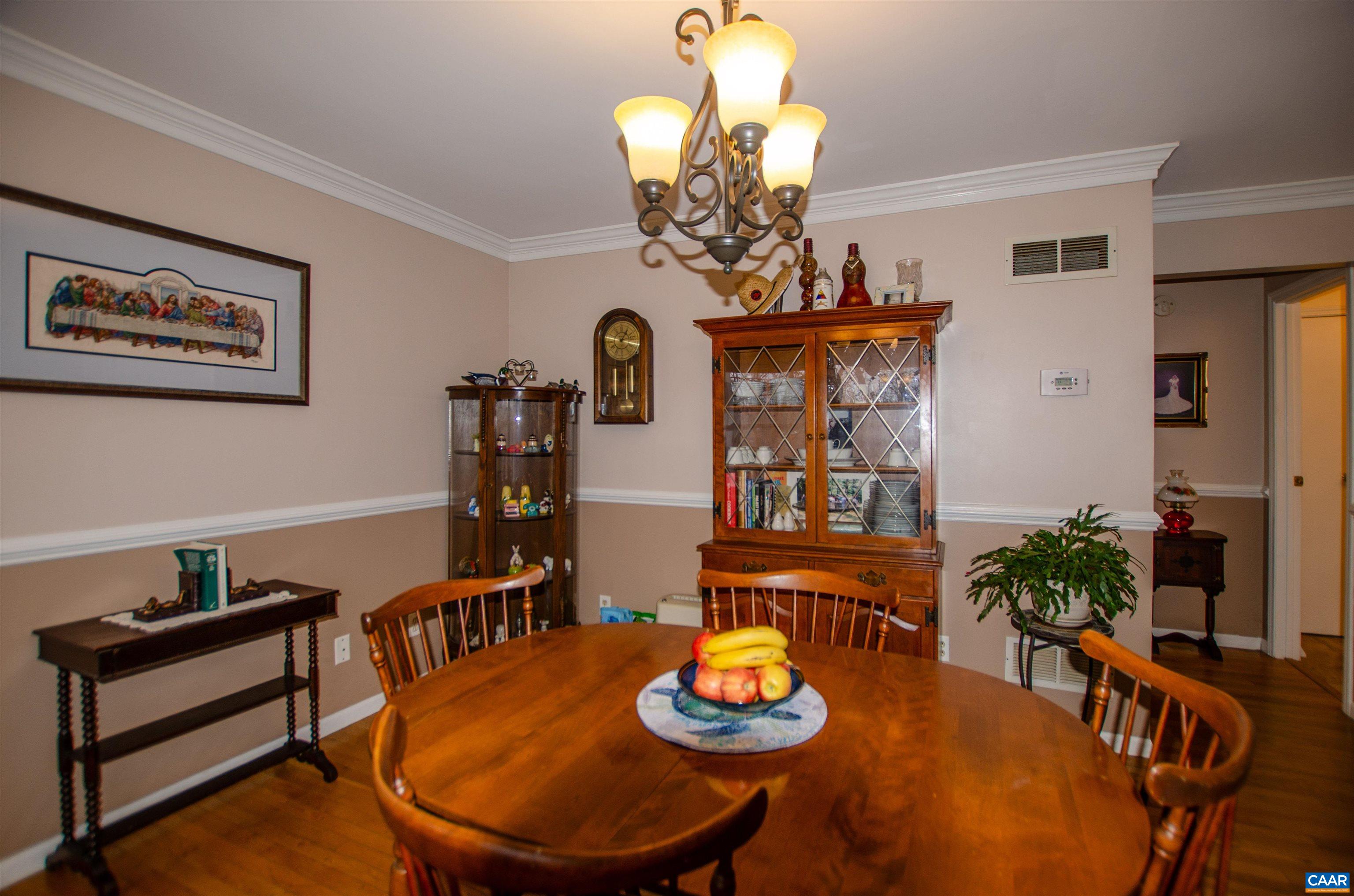 1709 Courthouse Road Palmyra, VA 22963 - Photo 7 of 59 a view of a dining room with furniture and chandelier