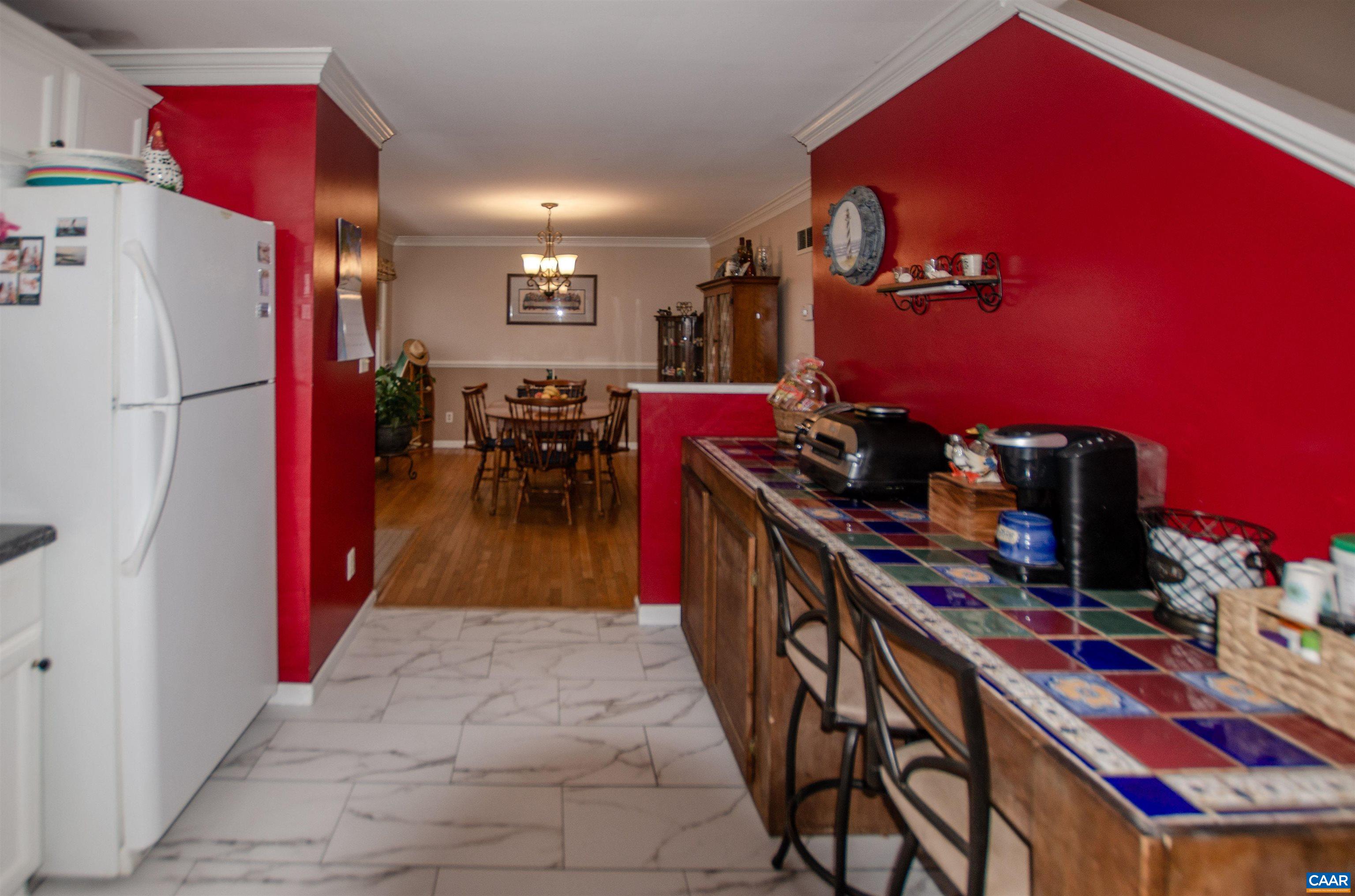 1709 Courthouse Road Palmyra, VA 22963 - Photo 9 of 59 a hallway with dining table and chairs