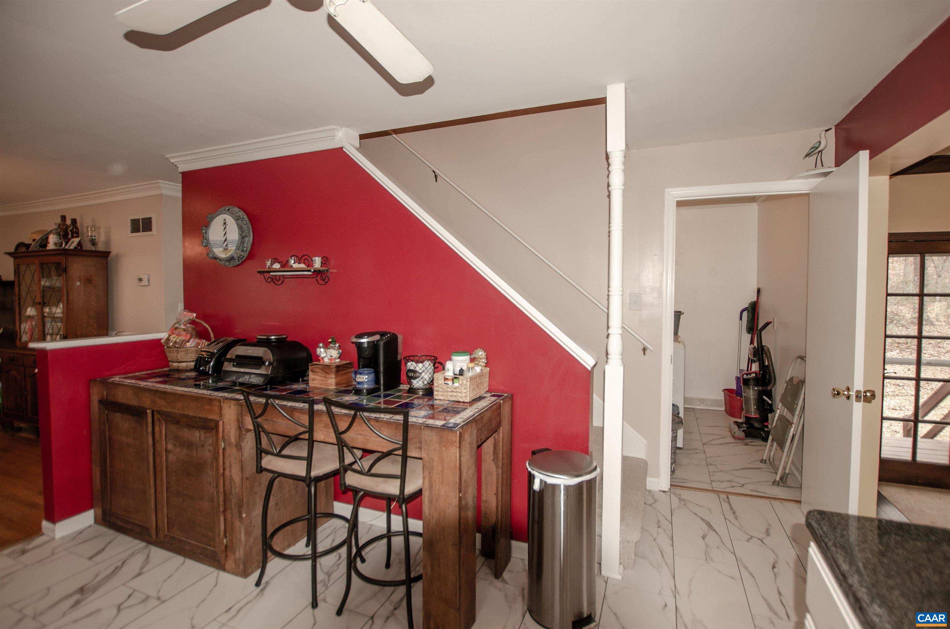 1709 Courthouse Road Palmyra, VA 22963 - Photo 10 of 59 a view of a dining room with furniture and wooden floor