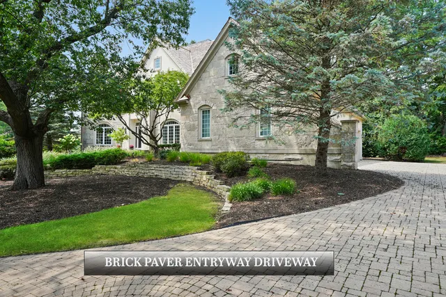 a living room with dining room and wooden floor