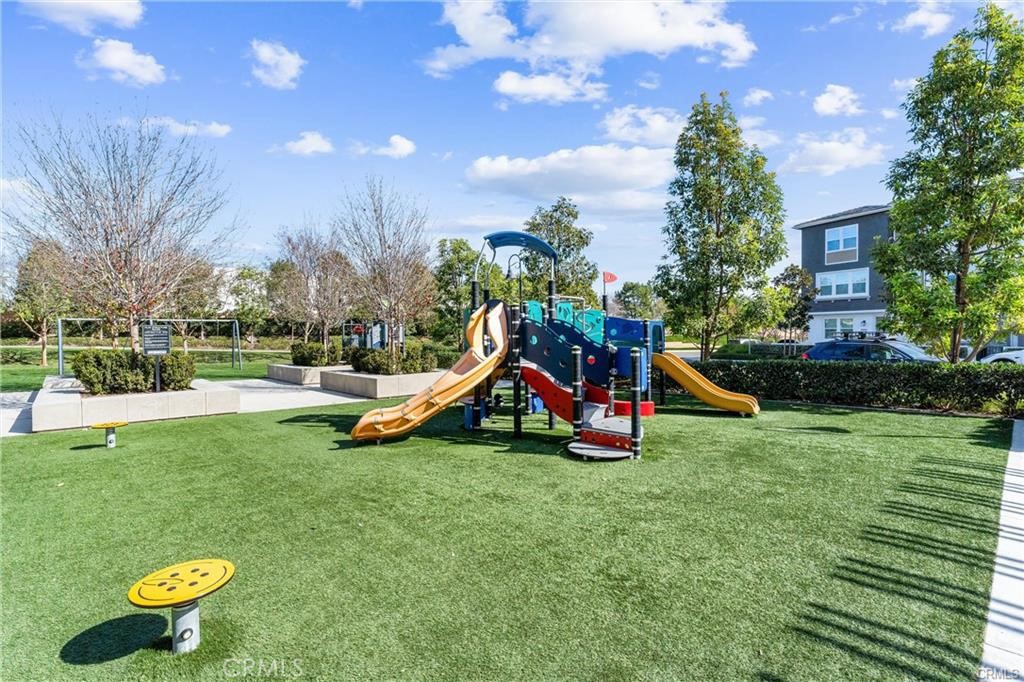 117 Denali Lake Forest, CA 92630 - Photo 30 of 40 a view of a playground with a slide and a fire pit