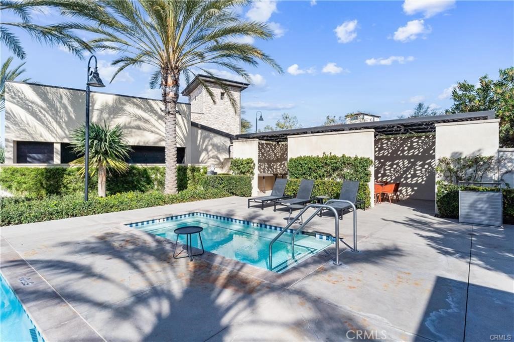 117 Denali Lake Forest, CA 92630 - Photo 35 of 40 a patio with table and chairs and potted plants