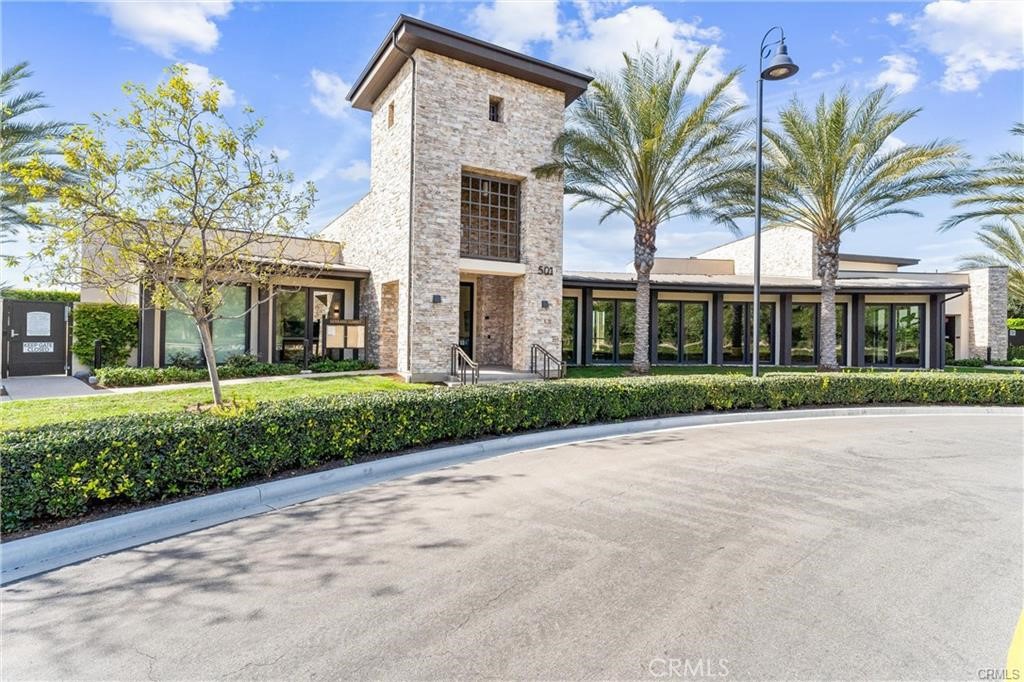 117 Denali Lake Forest, CA 92630 - Photo 36 of 40 front view of a house with a yard and palm trees