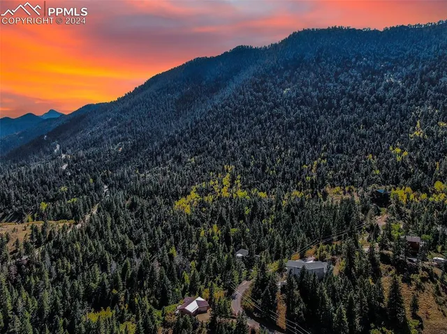 a view of a house with a mountain