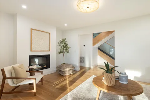 a bathroom with a sink a large mirror and vanity