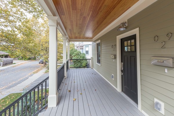 9 Bartlett Crescent, Unit 1 Brookline, MA 02446 - Photo 18 of 19 a view of balcony with wooden floor