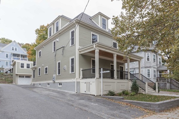 9 Bartlett Crescent, Unit 1 Brookline, MA 02446 - Photo 19 of 19 front view of a house