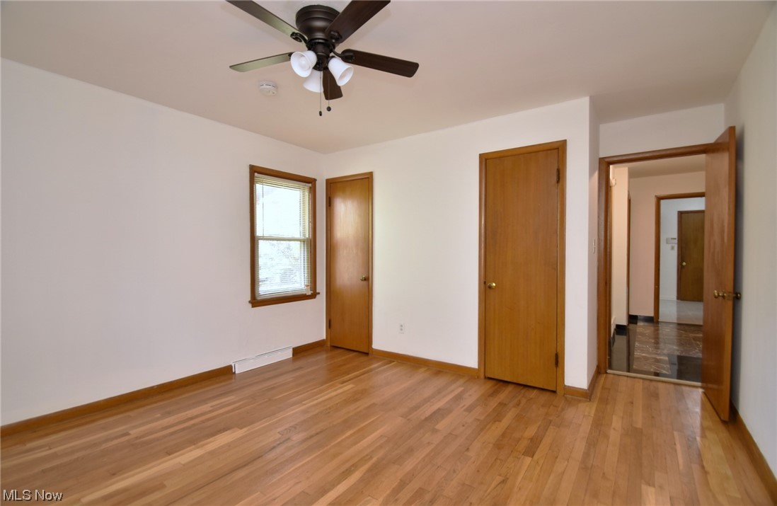 3681 Brinkmore Road Cleveland Heights, OH 44121 - Photo 16 of 27 Unfurnished bedroom featuring light wood-type flooring and ceiling fan