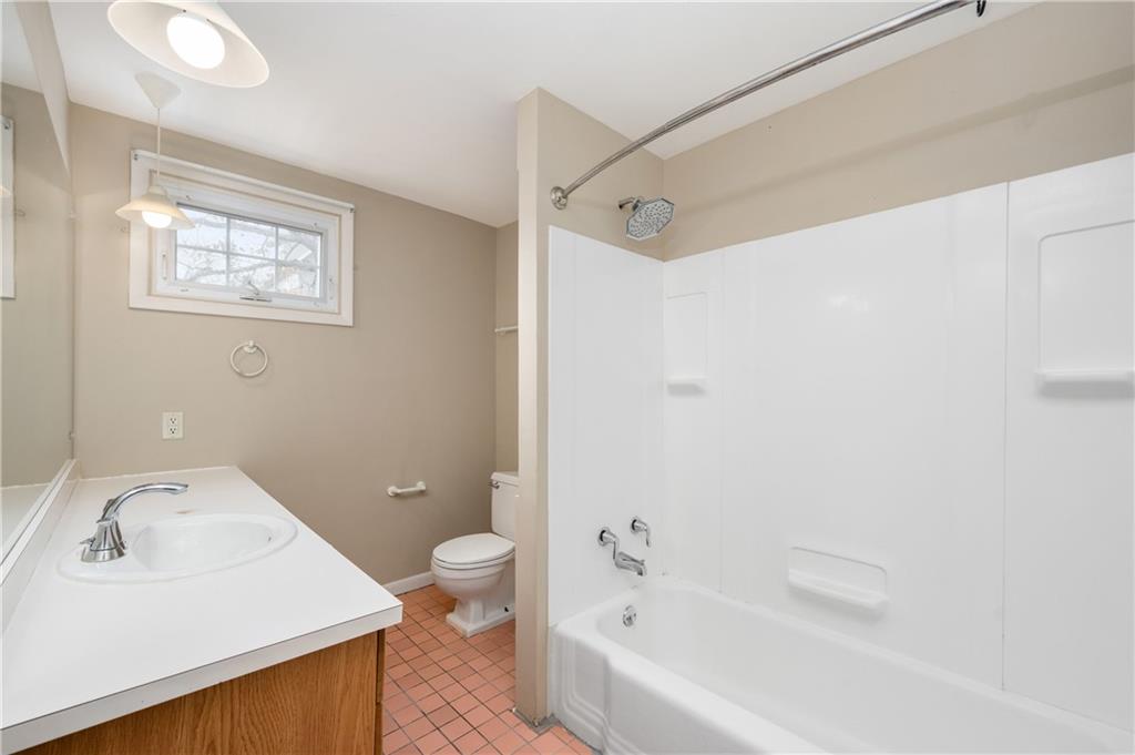 313 Oak Street Butler, PA 16001 - Photo 20 of 23 a bathroom with a sink a toilet and shower