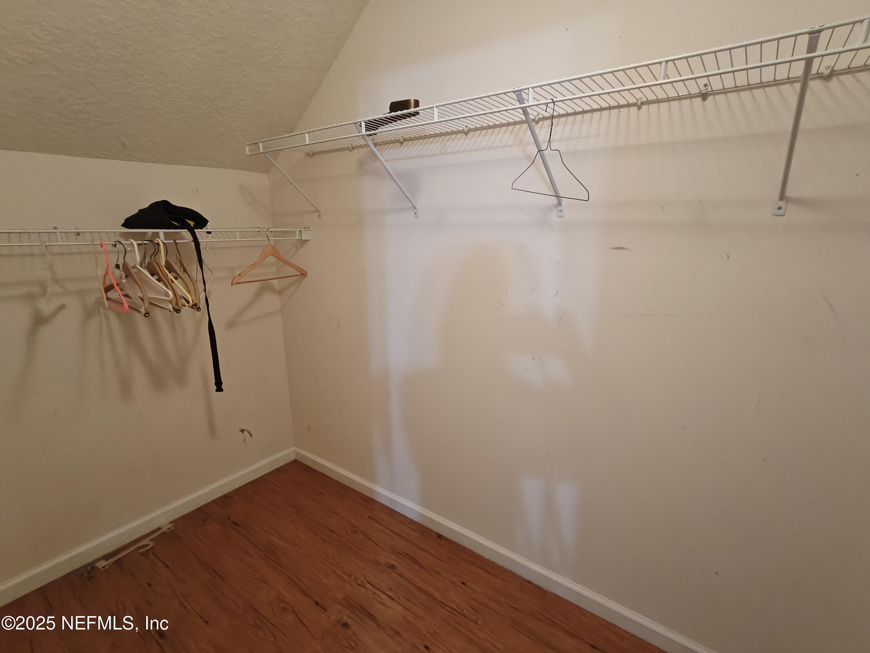 1505 Majestic View Lane Fleming Island, FL 32003 - Photo 37 of 49 a view of a room with racks on the wall