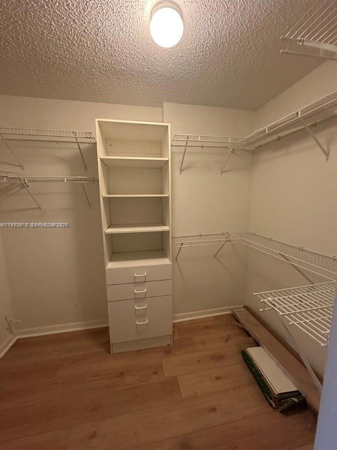 9587 Weldon Circle, Unit B203 Tamarac, FL 33321 - Photo 19 of 22 a room with storage and utility