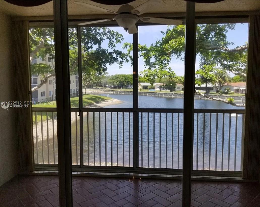 9587 Weldon Circle, Unit B203 Tamarac, FL 33321 - Photo 2 of 22 a view of a porch