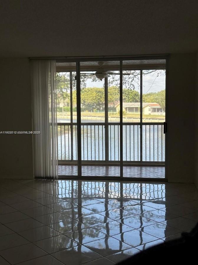 9587 Weldon Circle, Unit B203 Tamarac, FL 33321 - Photo 21 of 22 a view of a porch