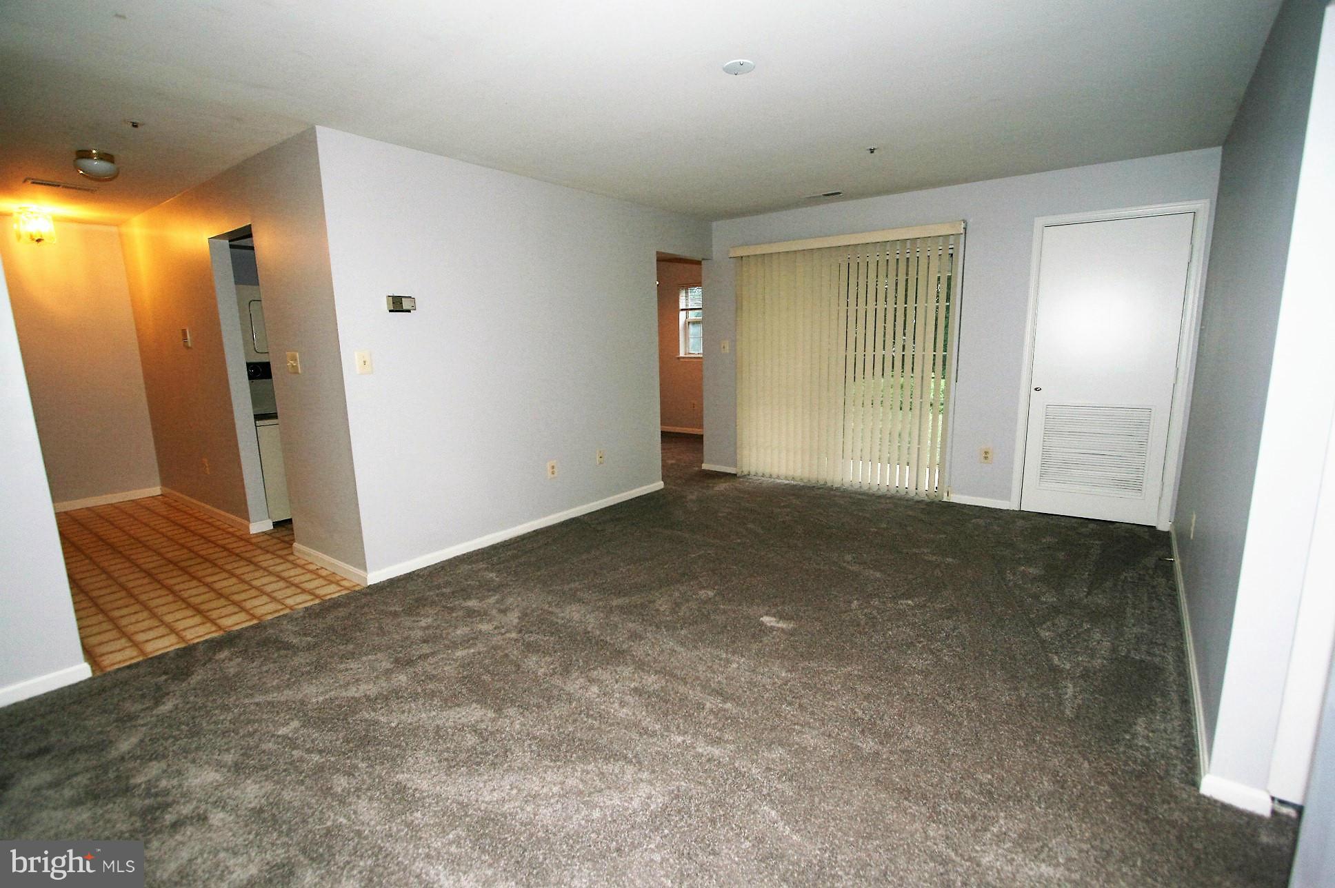 8583 Falls Run Road, Unit C Ellicott City, MD 21043 - Photo 5 of 21 Living Room with slider to patio