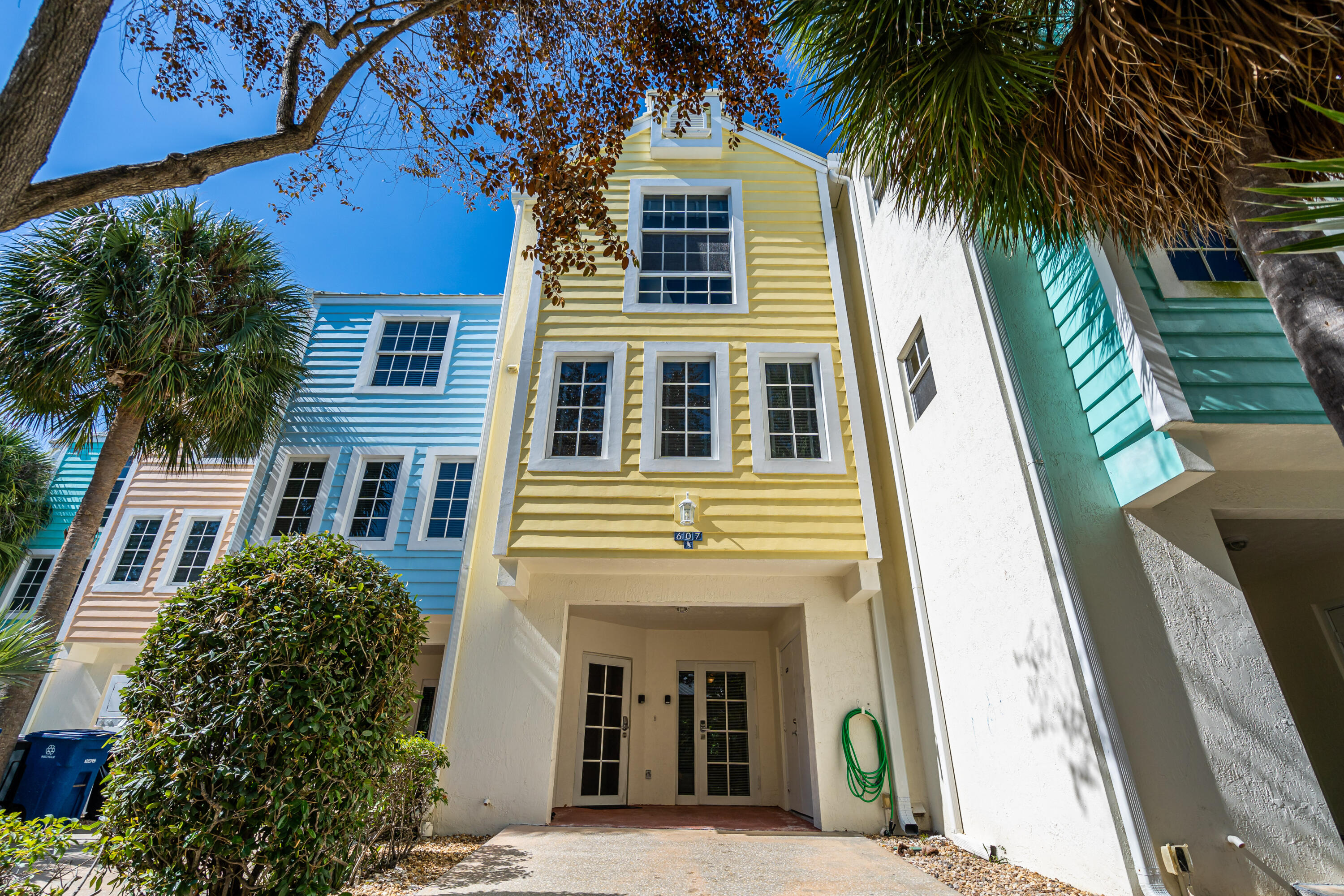 97501 Overseas Highway, Unit 607 Key Largo, FL 33037 - Photo 16 of 73 a front view of a house with a yard